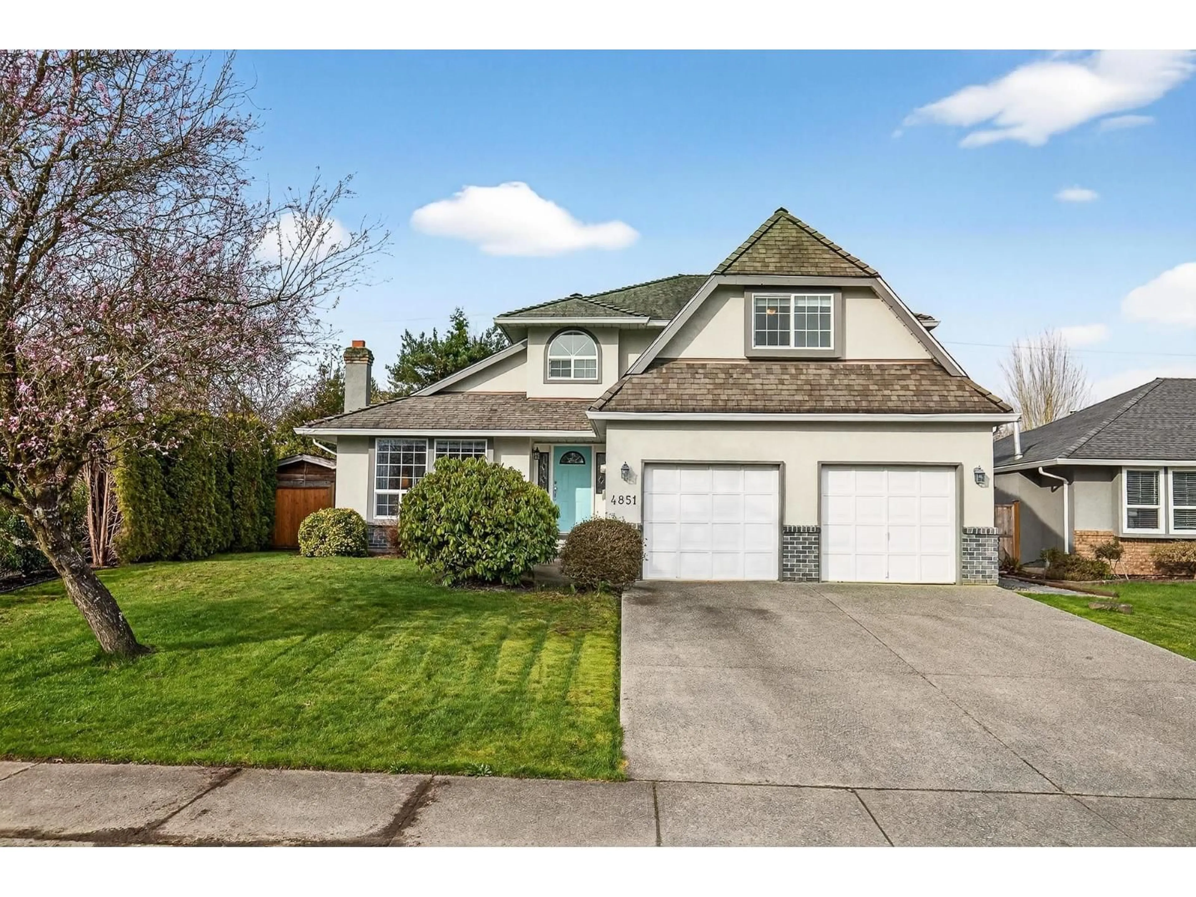 Home with vinyl exterior material, street for 4851 208A STREET, Langley British Columbia V3A5X9