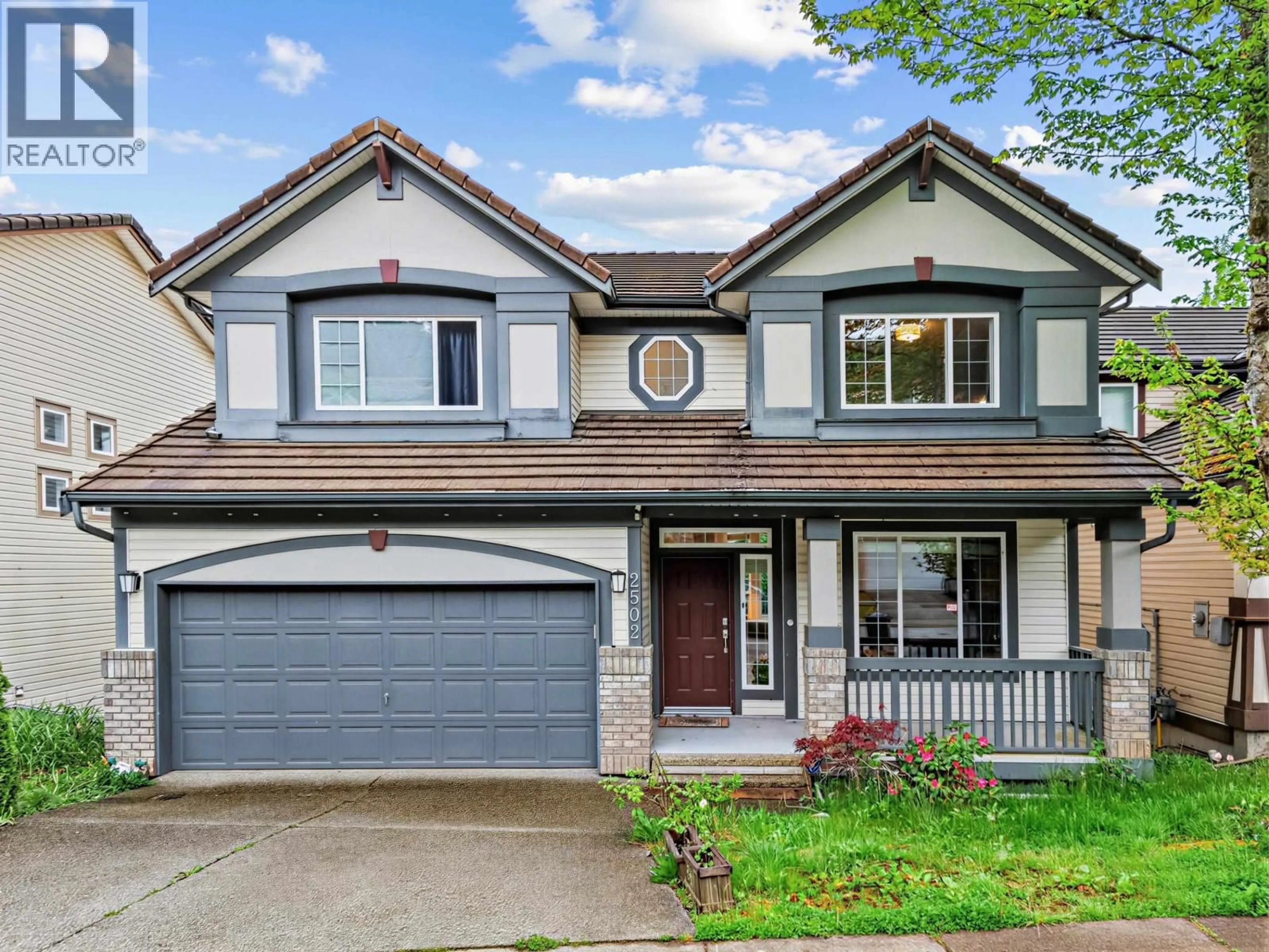 Home with vinyl exterior material, street for 2502 QUARTZ PLACE, Coquitlam British Columbia V3E3K9