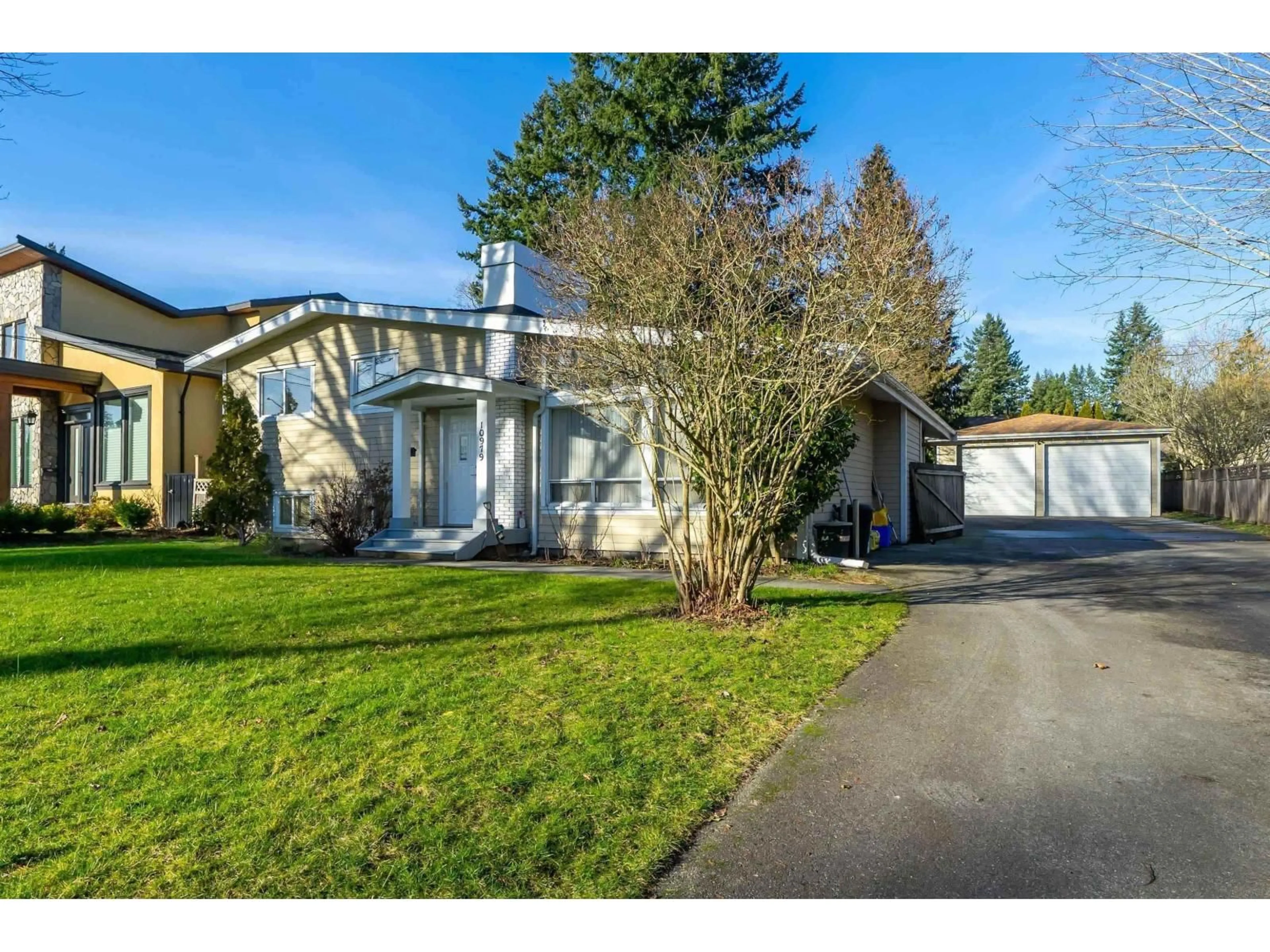 A pic from outside/outdoor area/front of a property/back of a property/a pic from drone, street for 10979 64A AVENUE, Delta British Columbia V4E1E4