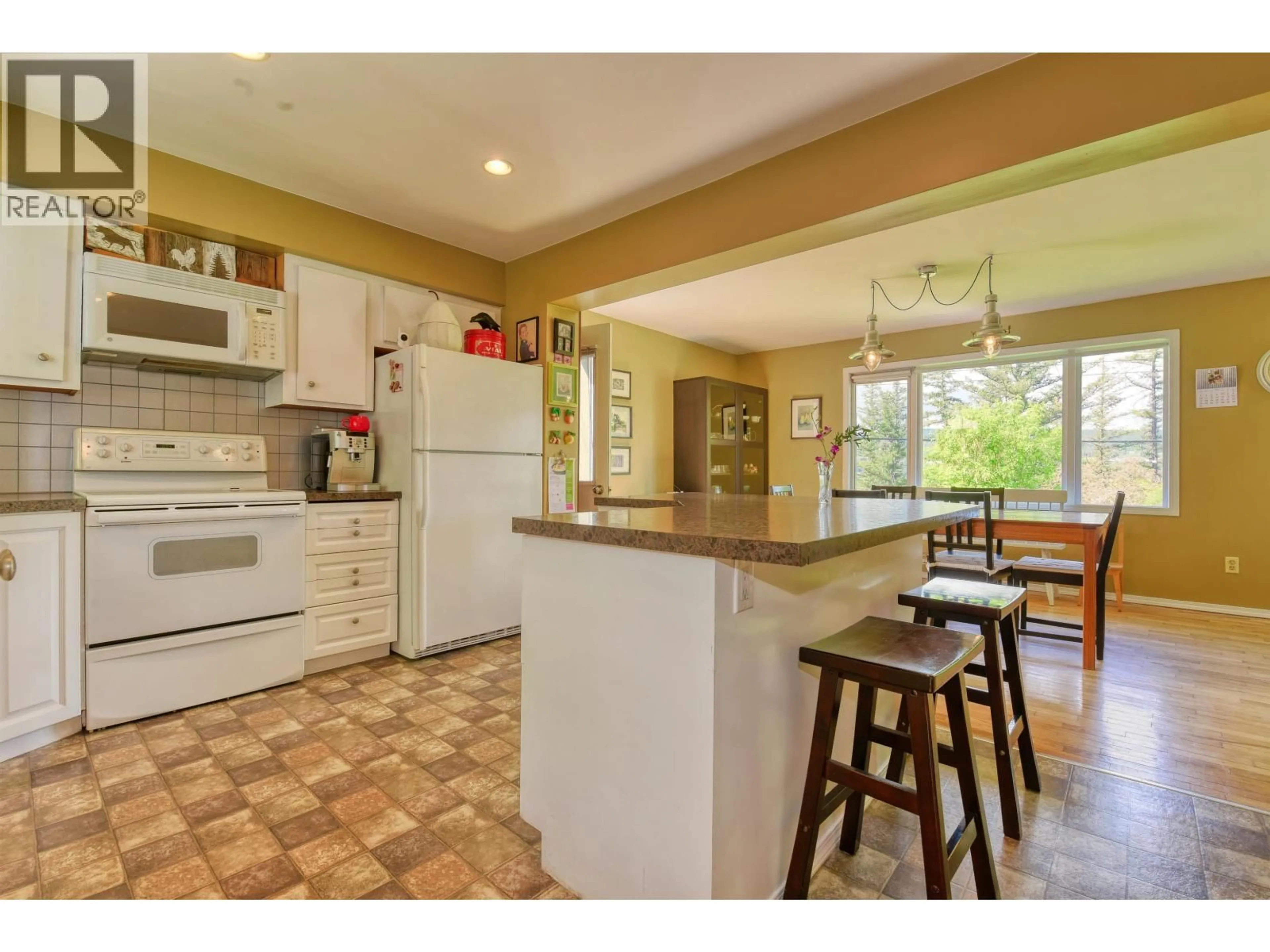 Open concept kitchen, ceramic/tile floor for 8 WINDMILL CRESCENT, Williams Lake British Columbia V2G1A7