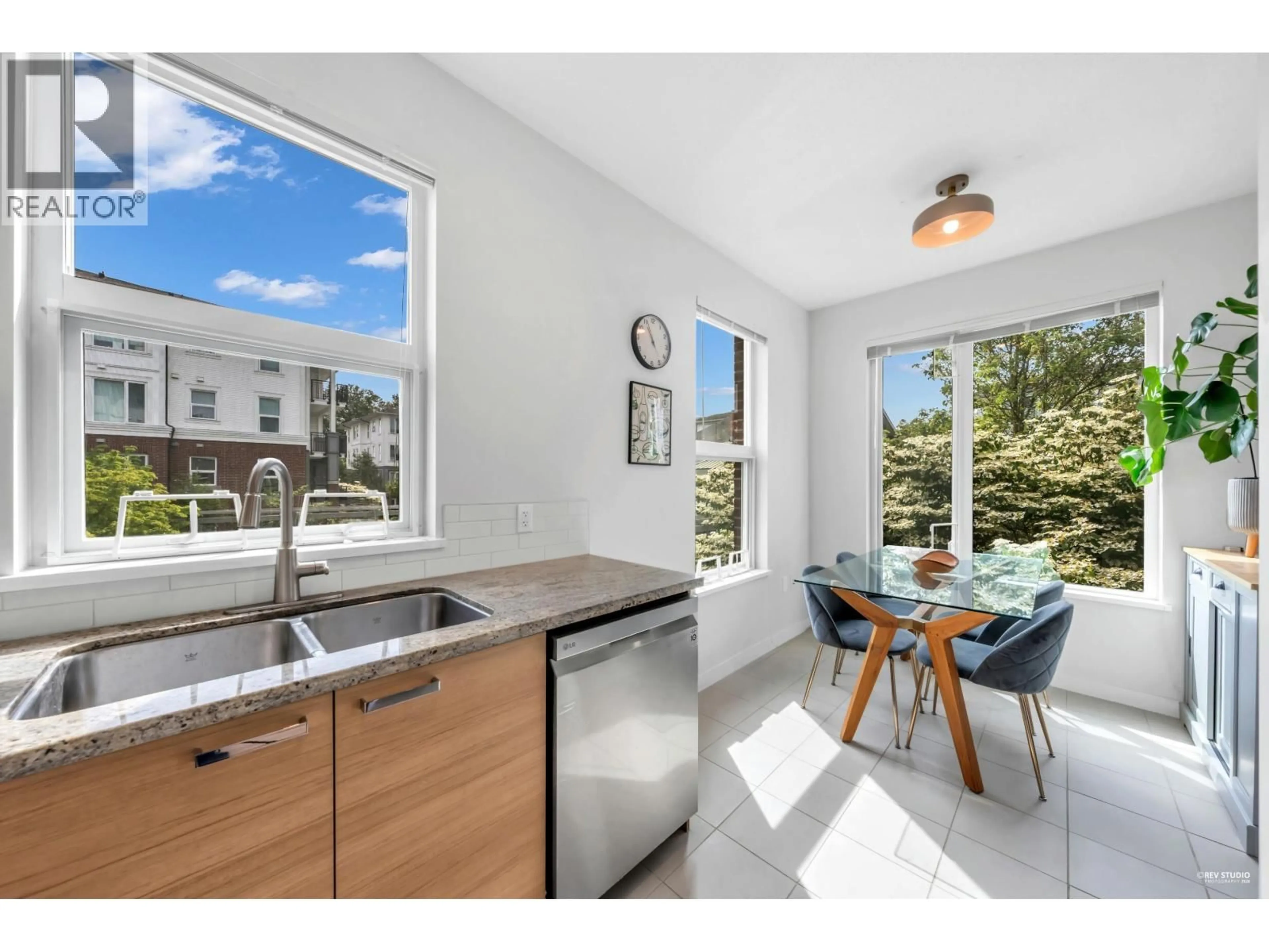 Open concept kitchen, unknown for 218 - 9388 MCKIM WAY, Richmond British Columbia V6X0J7
