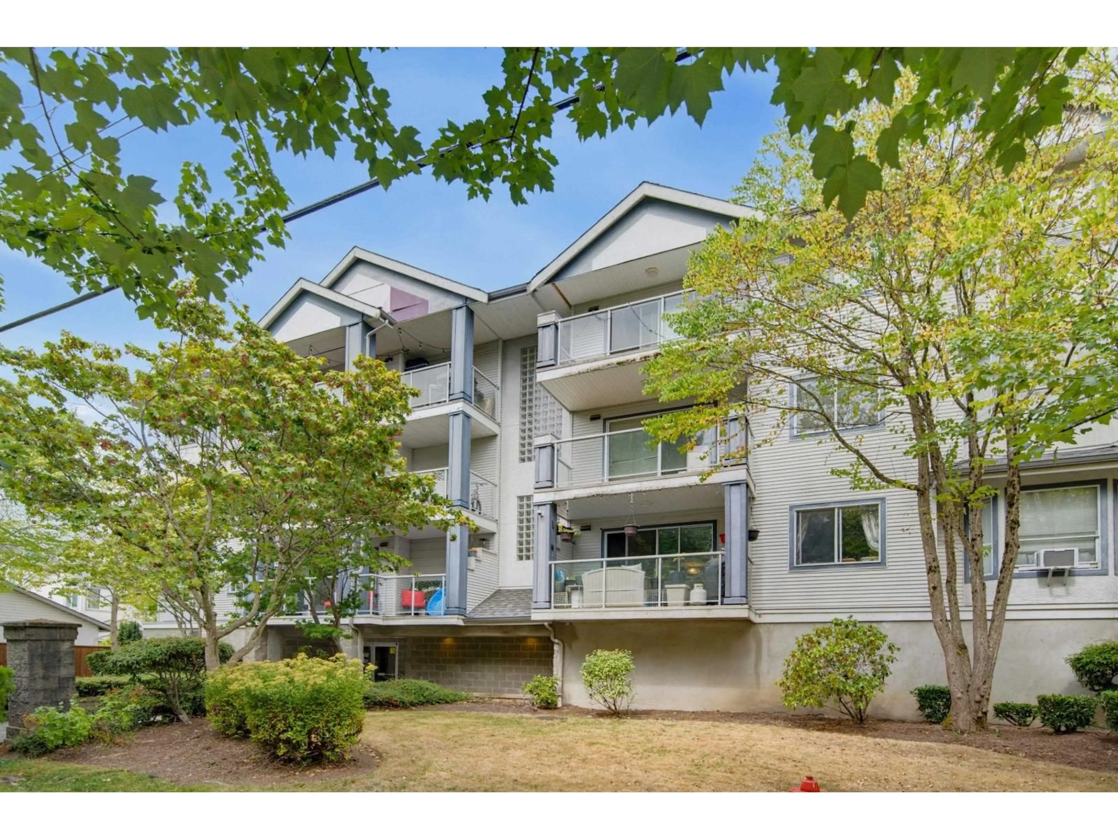 A pic from outside/outdoor area/front of a property/back of a property/a pic from drone, unknown for 314 - 20177 54A AVENUE, Langley British Columbia V3A3W6
