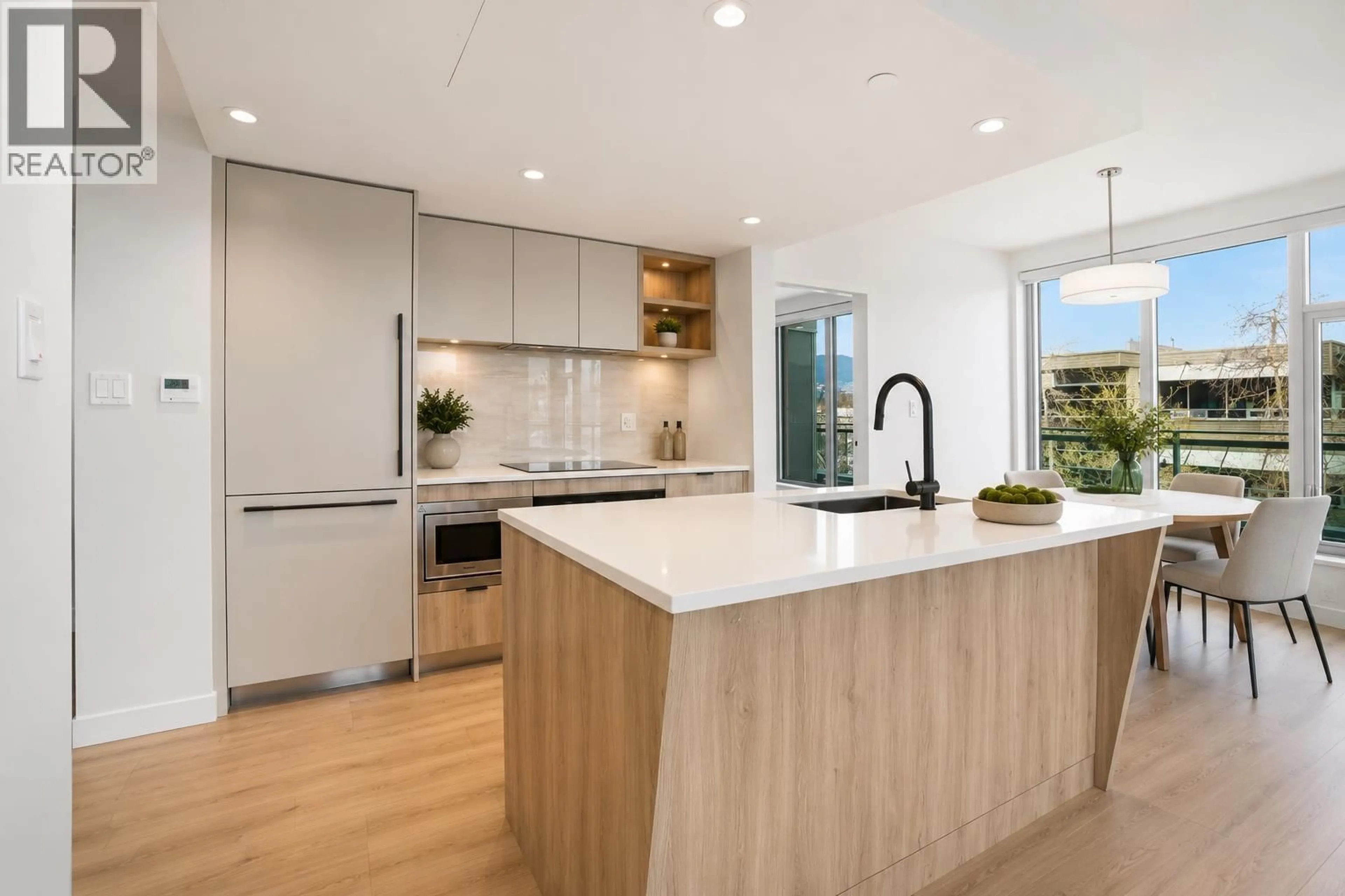 Open concept kitchen, unknown for 312 - 755 HARBOURSIDE DRIVE, North Vancouver British Columbia V7P0G1