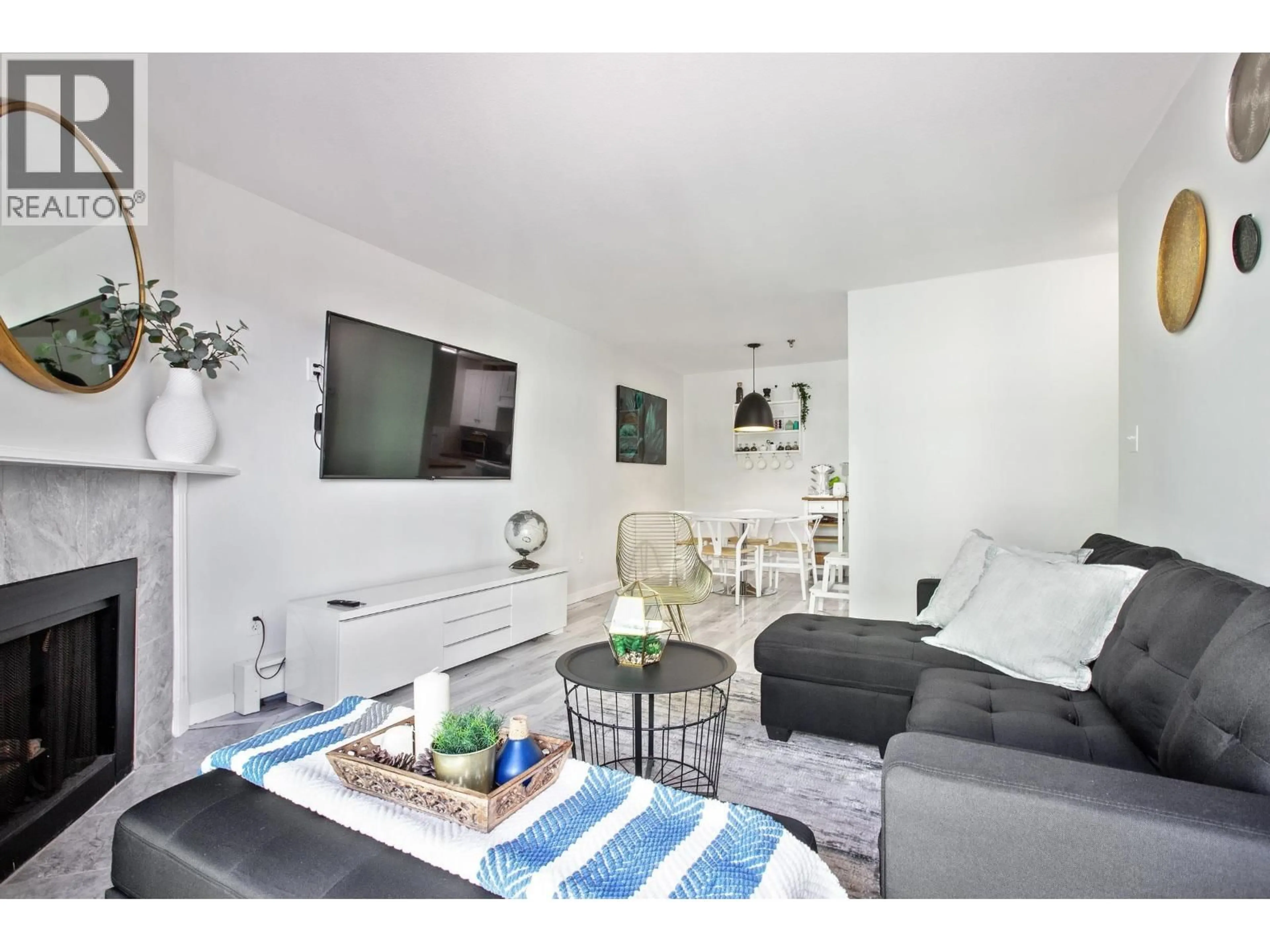 Living room with furniture, wood/laminate floor for 440 - 22661 LOUGHEED HIGHWAY, Maple Ridge British Columbia V2X2V4