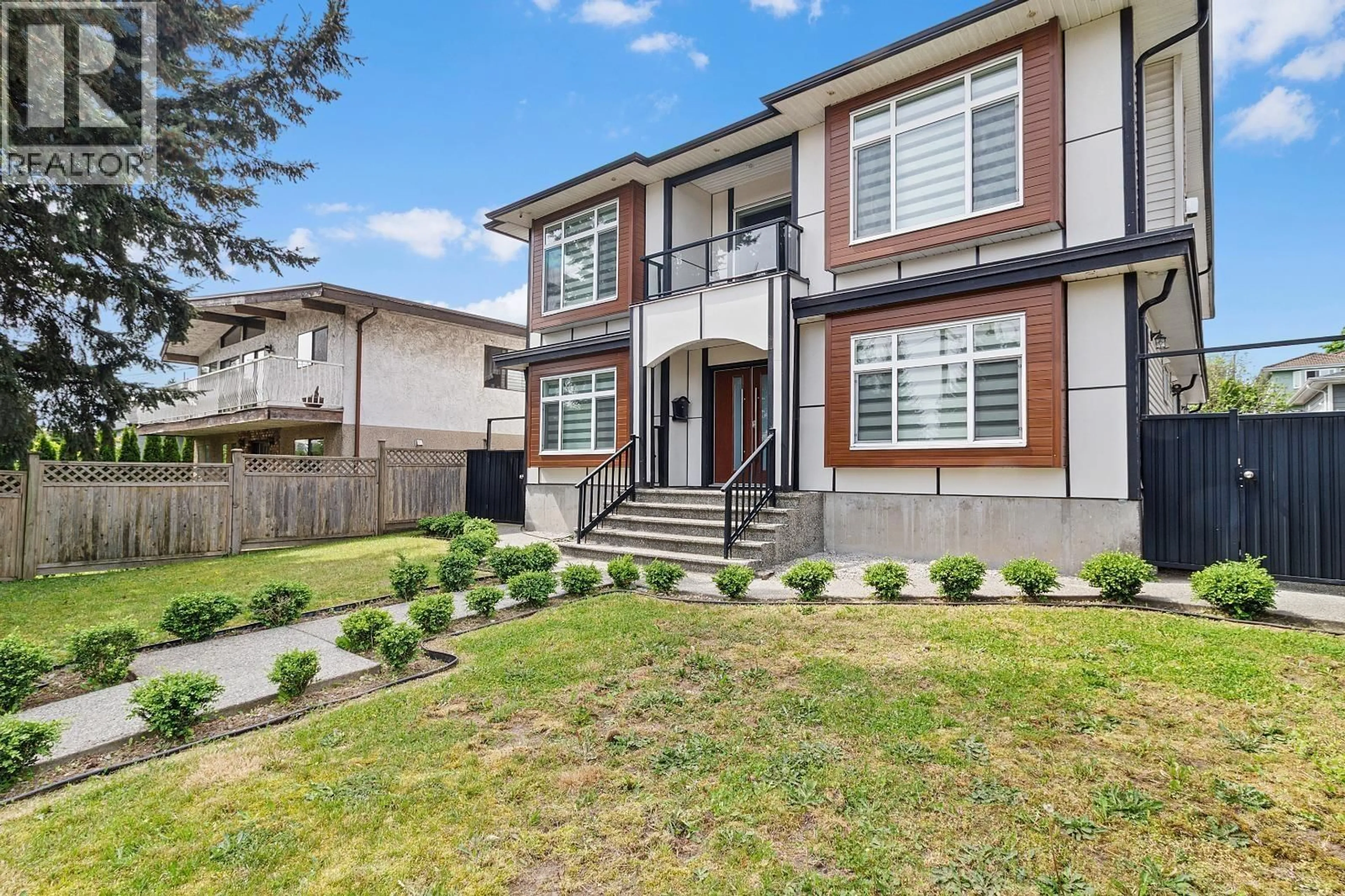 Home with vinyl exterior material, street for 8175 10TH AVENUE, Burnaby British Columbia V3N2S5