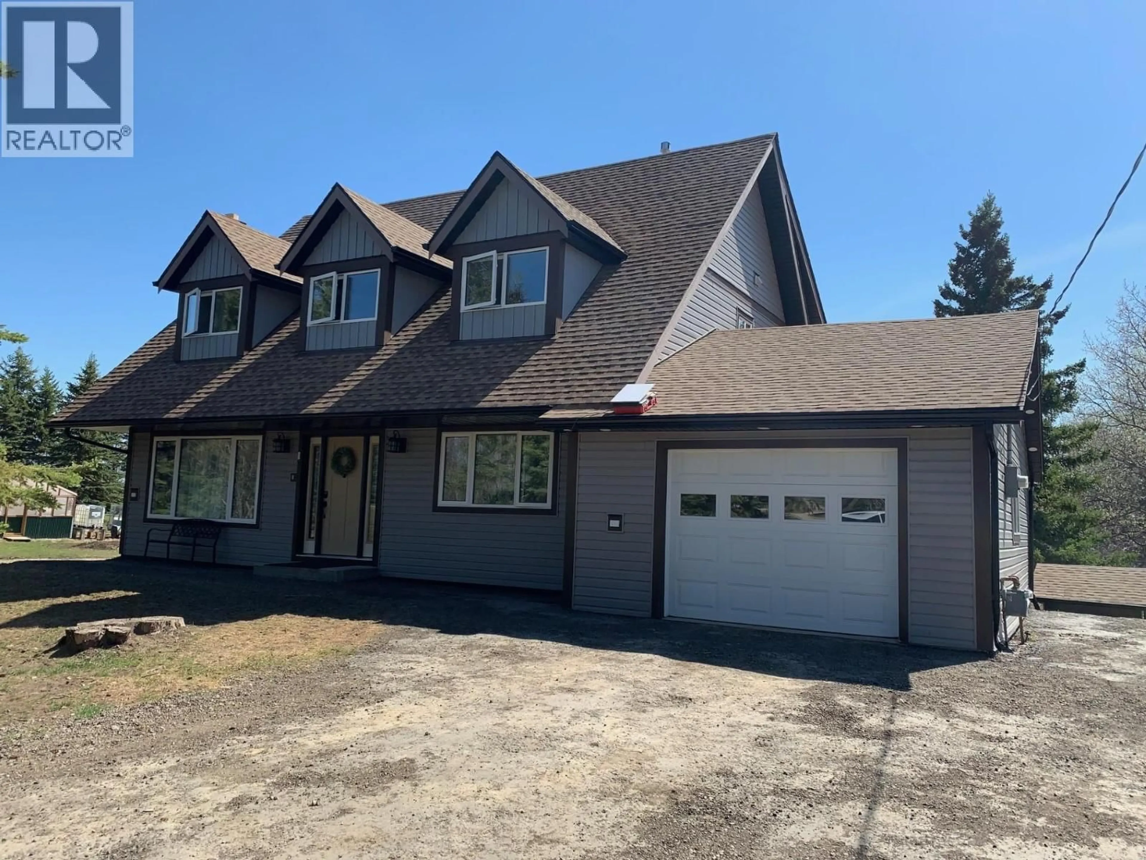 Home with vinyl exterior material, street for 4895 CECIL LAKE ROAD, Fort St. John British Columbia V1J8E2
