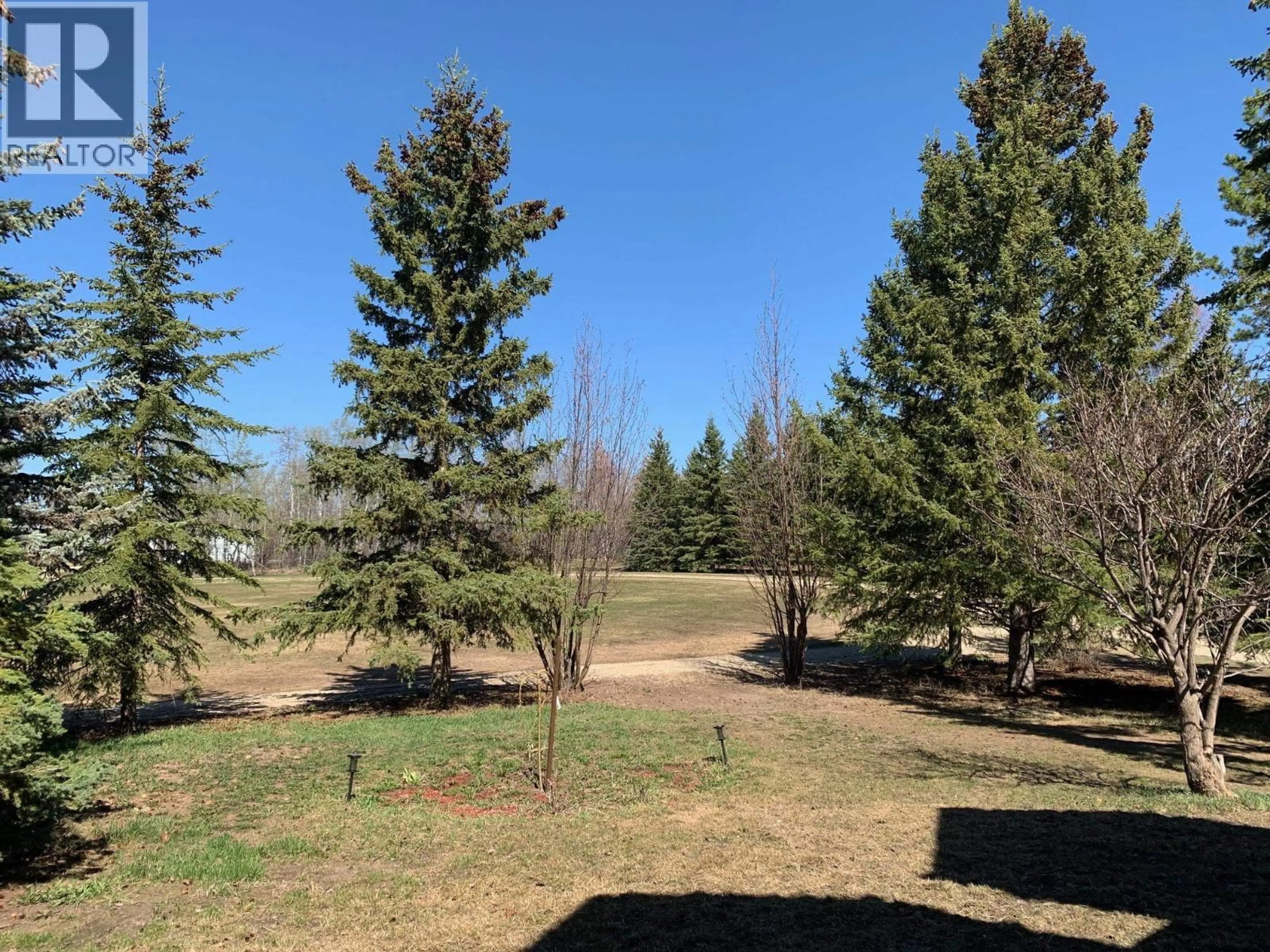 A pic from outside/outdoor area/front of a property/back of a property/a pic from drone, forest/trees view for 4895 CECIL LAKE ROAD, Fort St. John British Columbia V1J8E2