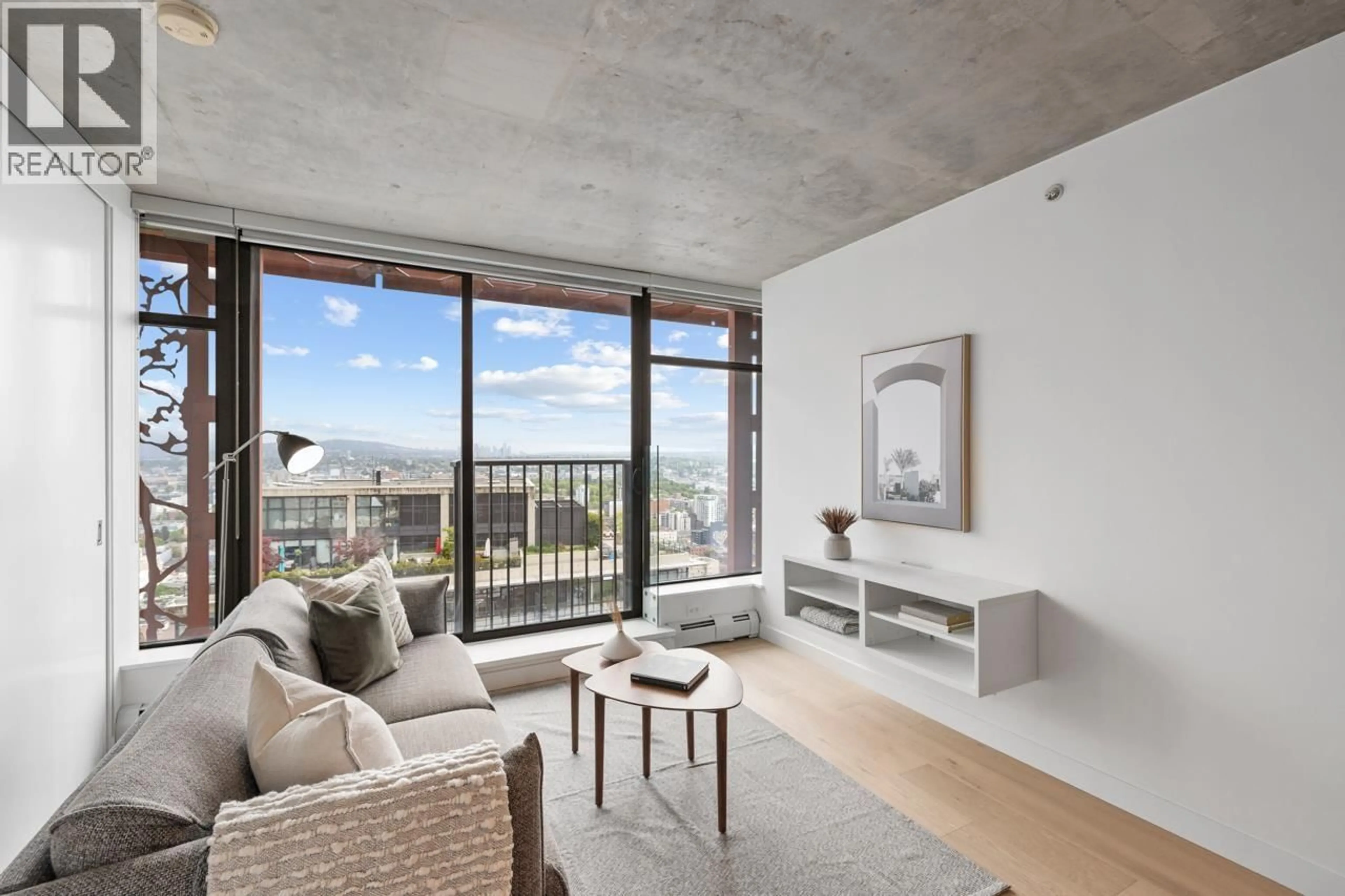 Living room with furniture, cement floor for 3705 - 128 CORDOVA STREET, Vancouver British Columbia V6B0E6