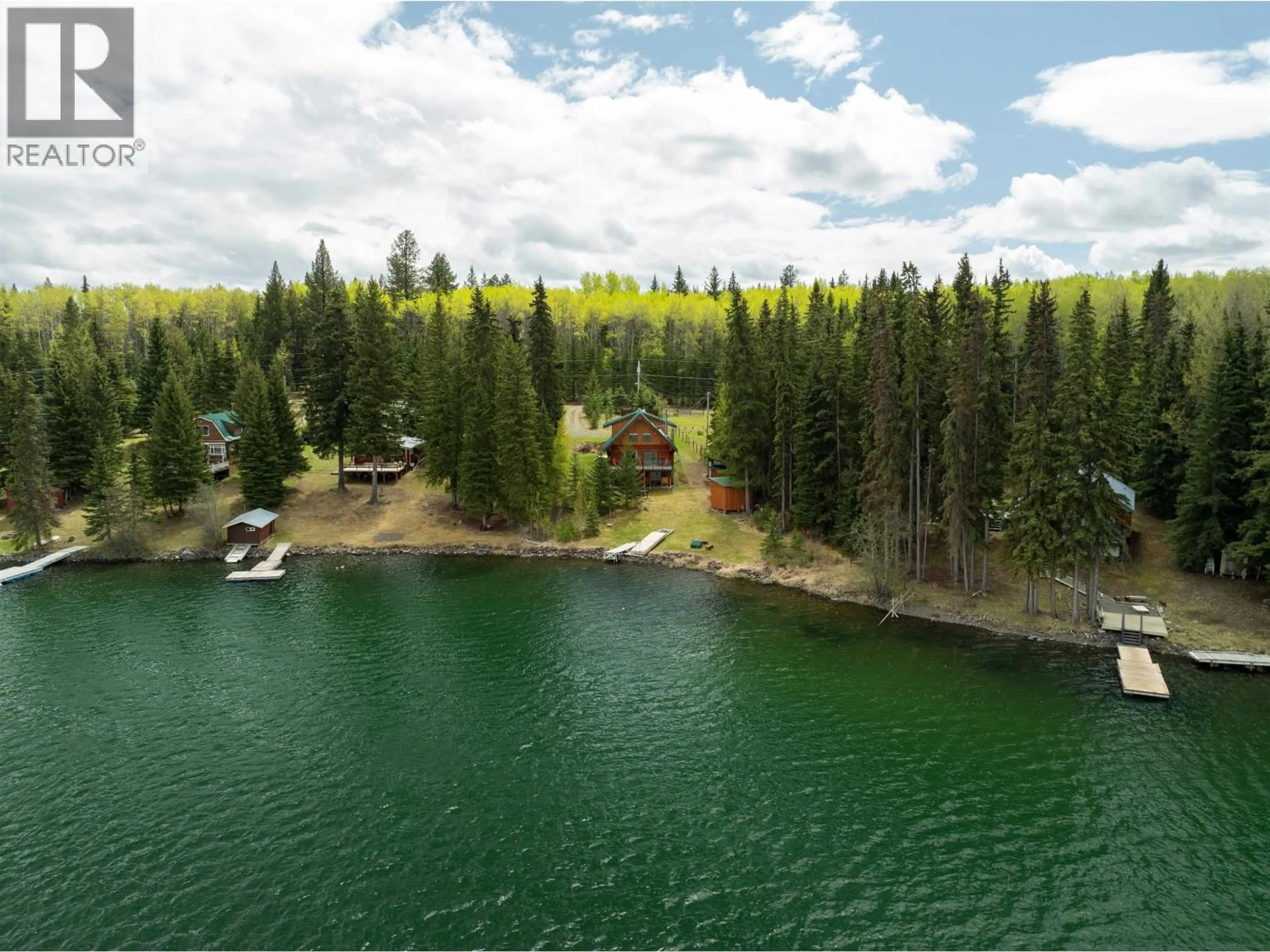 A pic from outside/outdoor area/front of a property/back of a property/a pic from drone, water/lake/river/ocean view for 7145 LINCOLN DRIVE, Bridge Lake British Columbia V0K1X1