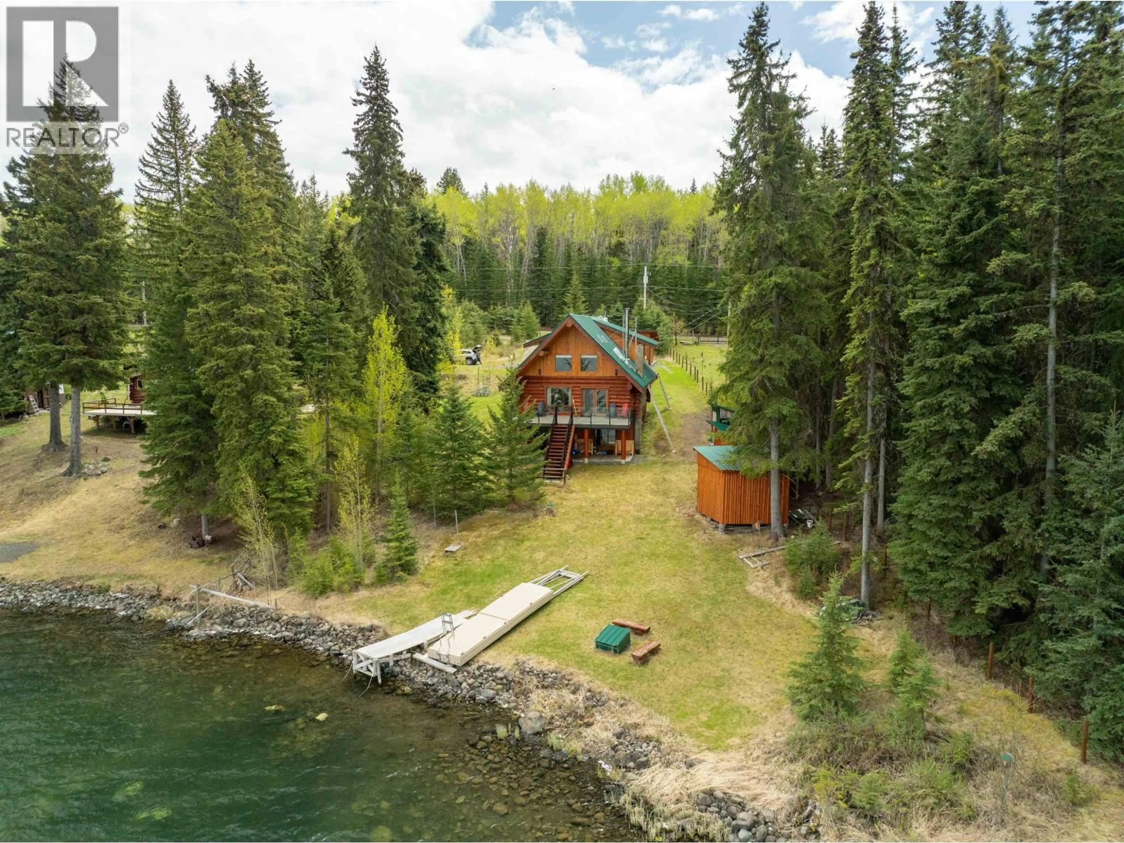 A pic from outside/outdoor area/front of a property/back of a property/a pic from drone, water/lake/river/ocean view for 7145 LINCOLN DRIVE, Bridge Lake British Columbia V0K1X1