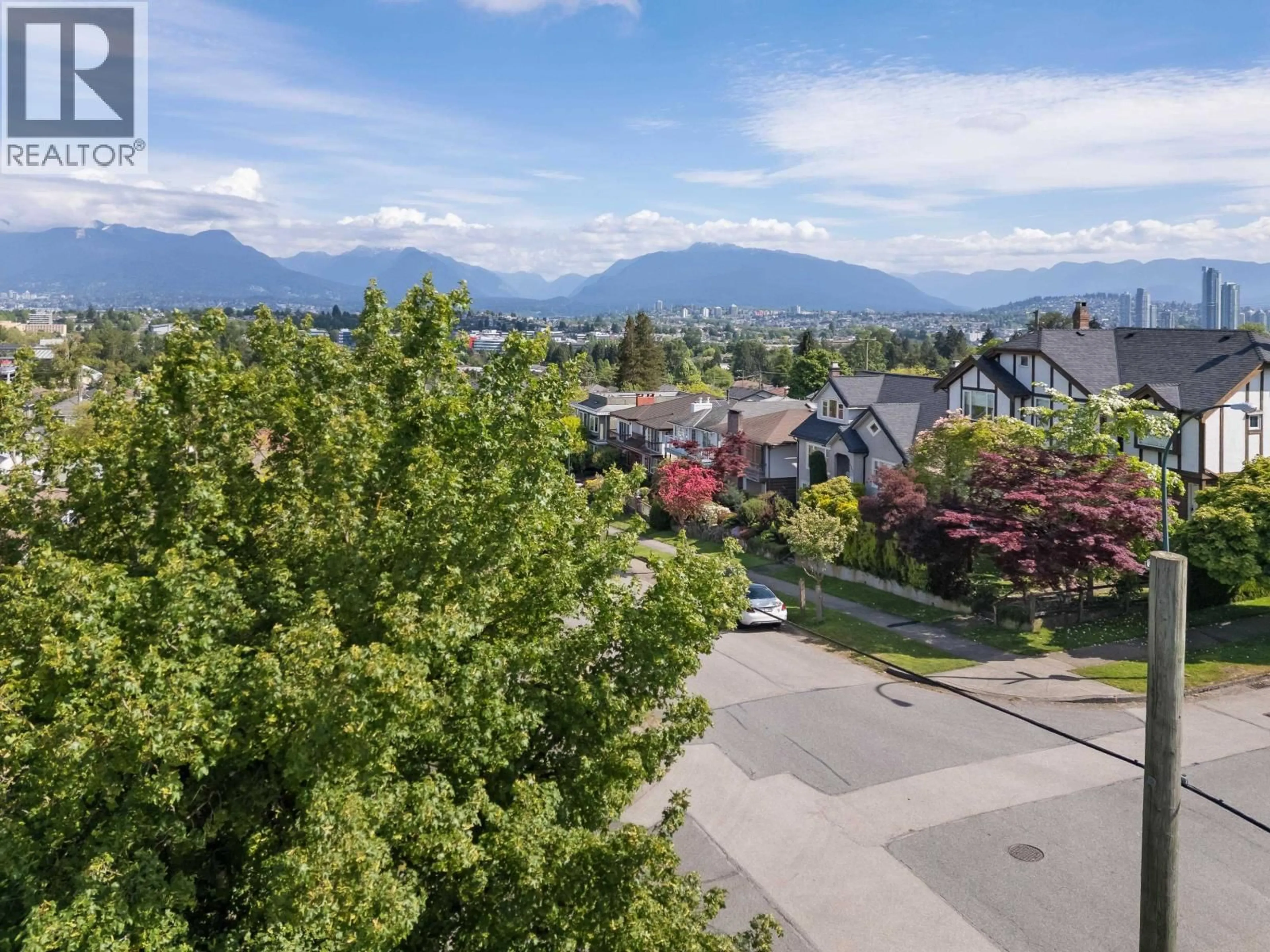 A pic from outside/outdoor area/front of a property/back of a property/a pic from drone, mountain view for 2798 24TH AVENUE, Vancouver British Columbia V5R1E4