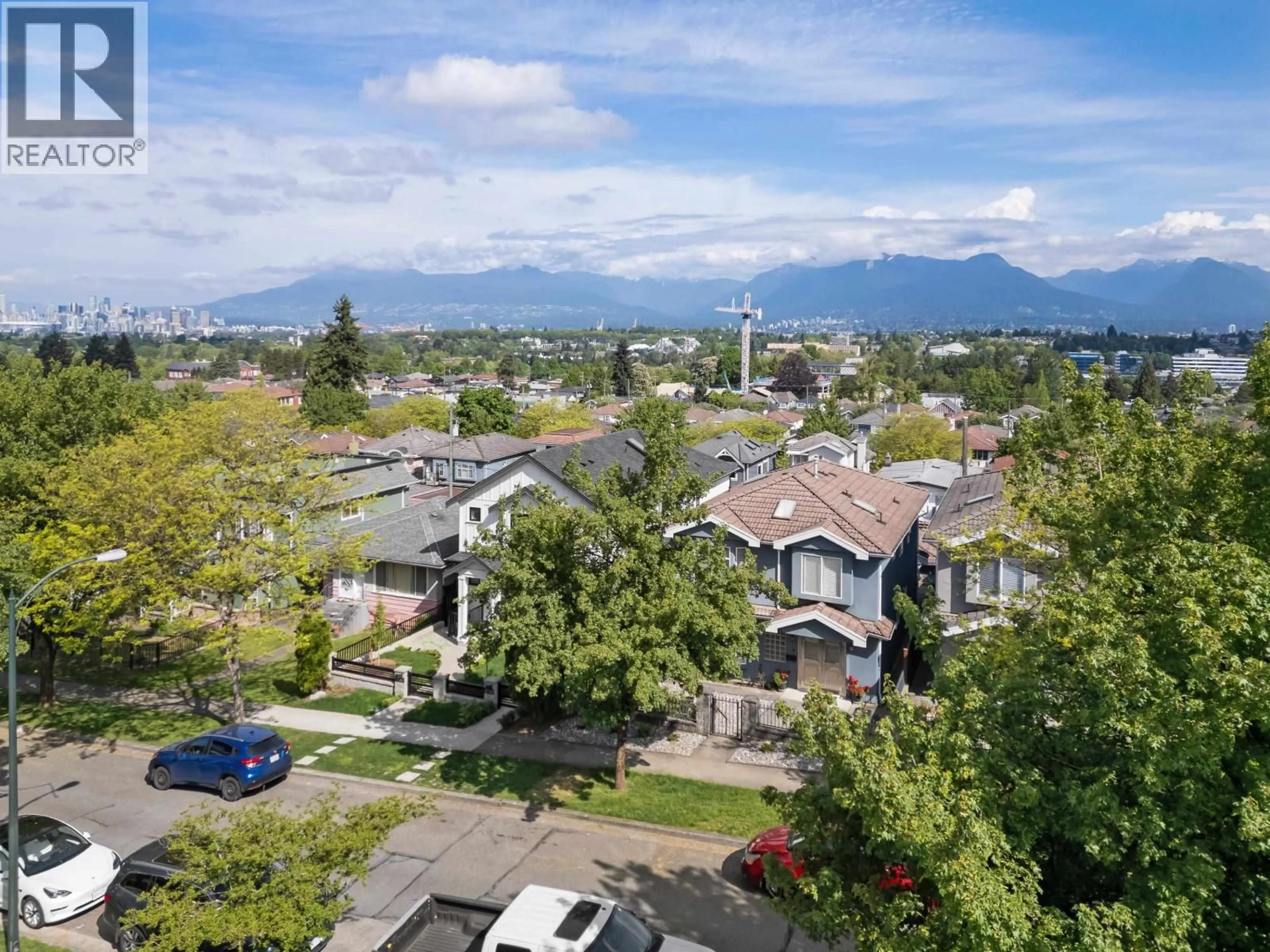 A pic from outside/outdoor area/front of a property/back of a property/a pic from drone, mountain view for 2798 24TH AVENUE, Vancouver British Columbia V5R1E4