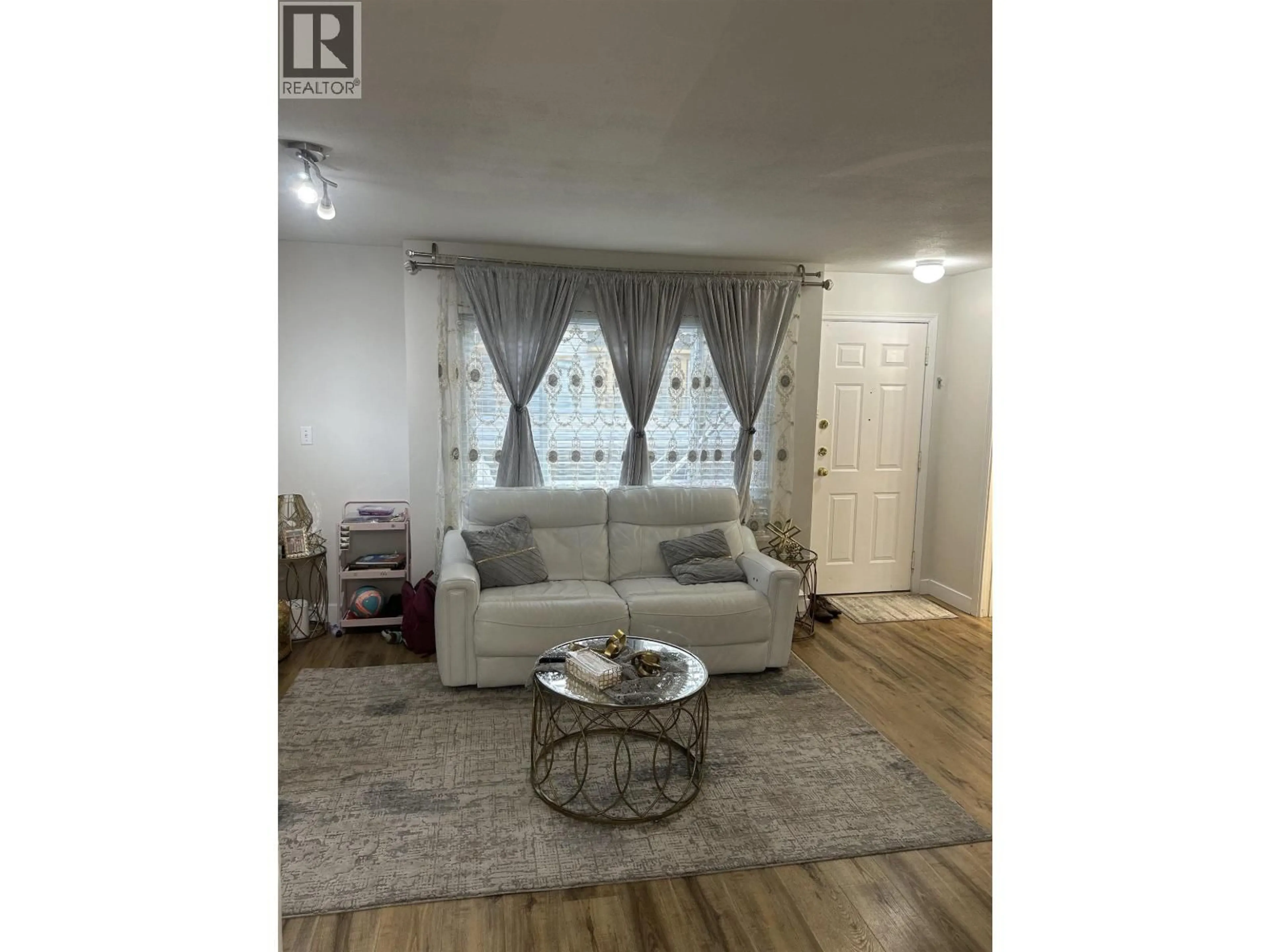 Living room with furniture, wood/laminate floor for 209 - 3978 ALBERT STREET, Burnaby British Columbia V5C2E1