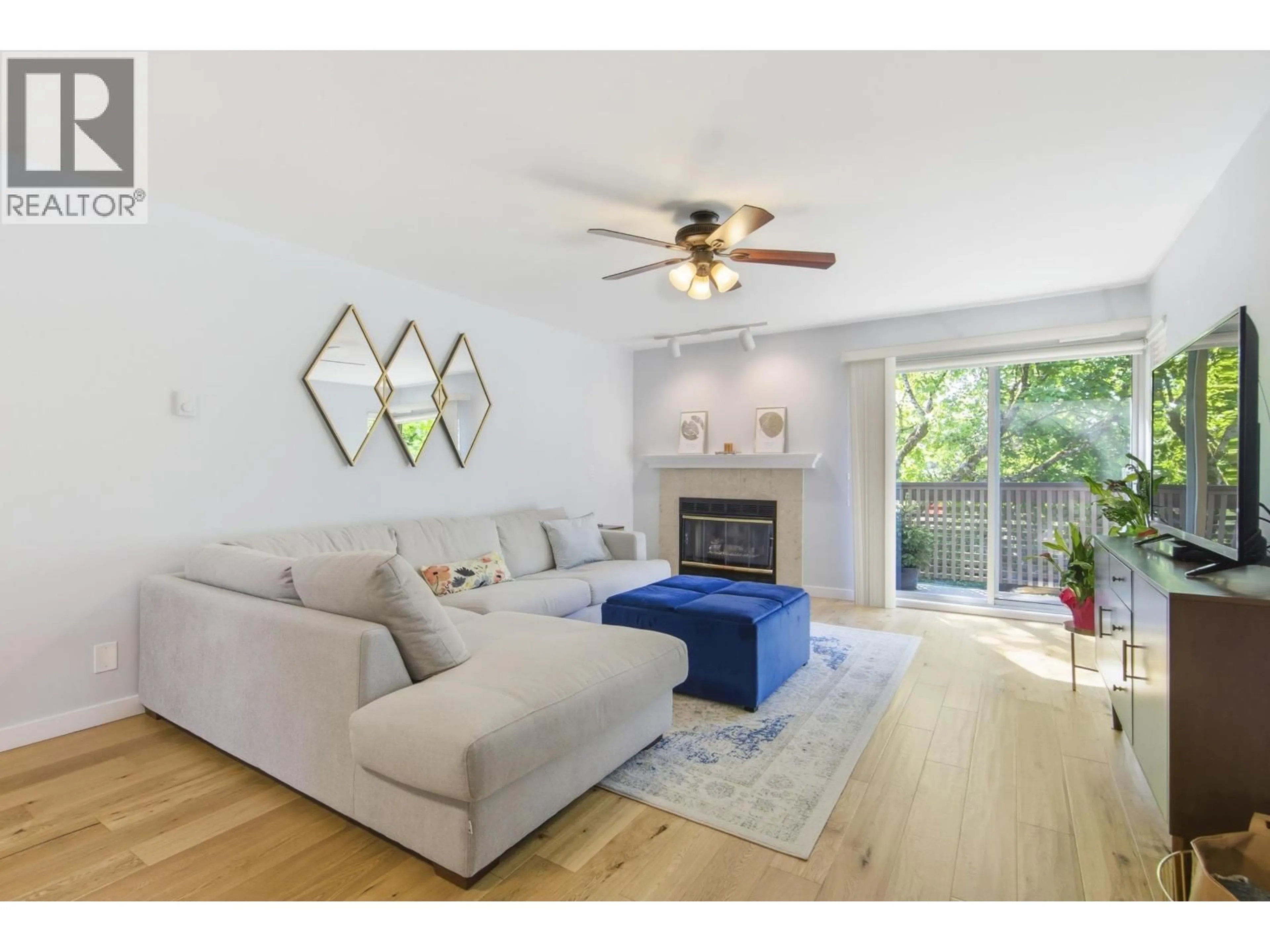 Living room with furniture, wood/laminate floor for 836 ROCHE POINT DRIVE, North Vancouver British Columbia V7H2T9