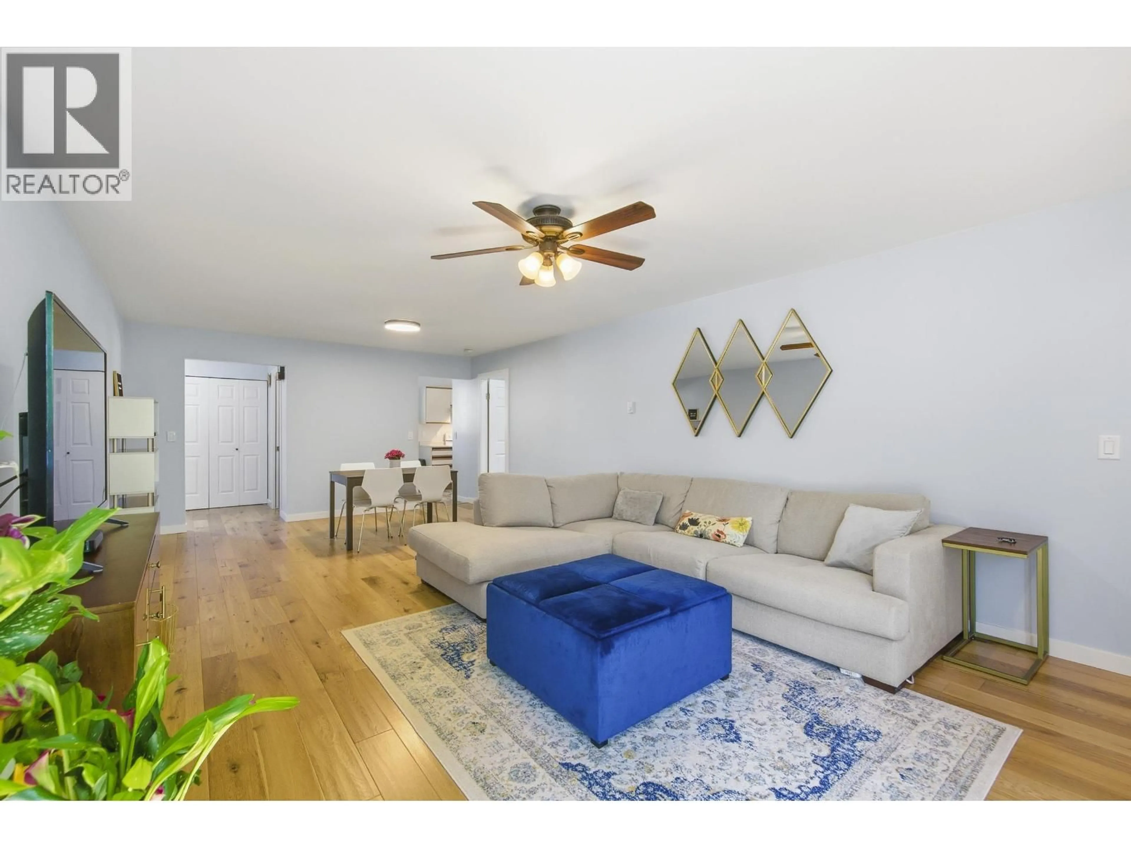 Living room with furniture, wood/laminate floor for 836 ROCHE POINT DRIVE, North Vancouver British Columbia V7H2T9