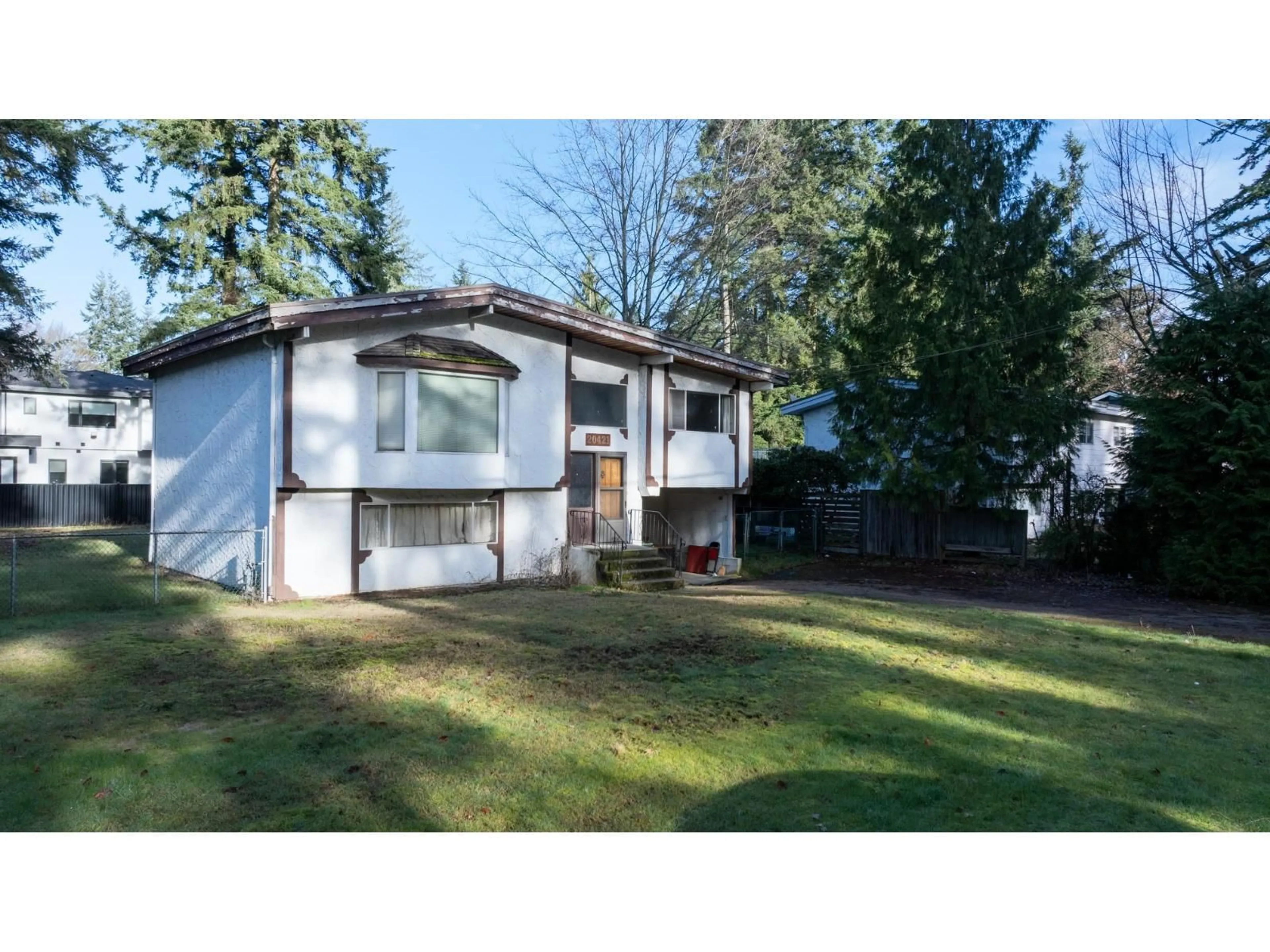 Home with vinyl exterior material, street for 20421 42 AVENUE, Langley British Columbia V3A3A8