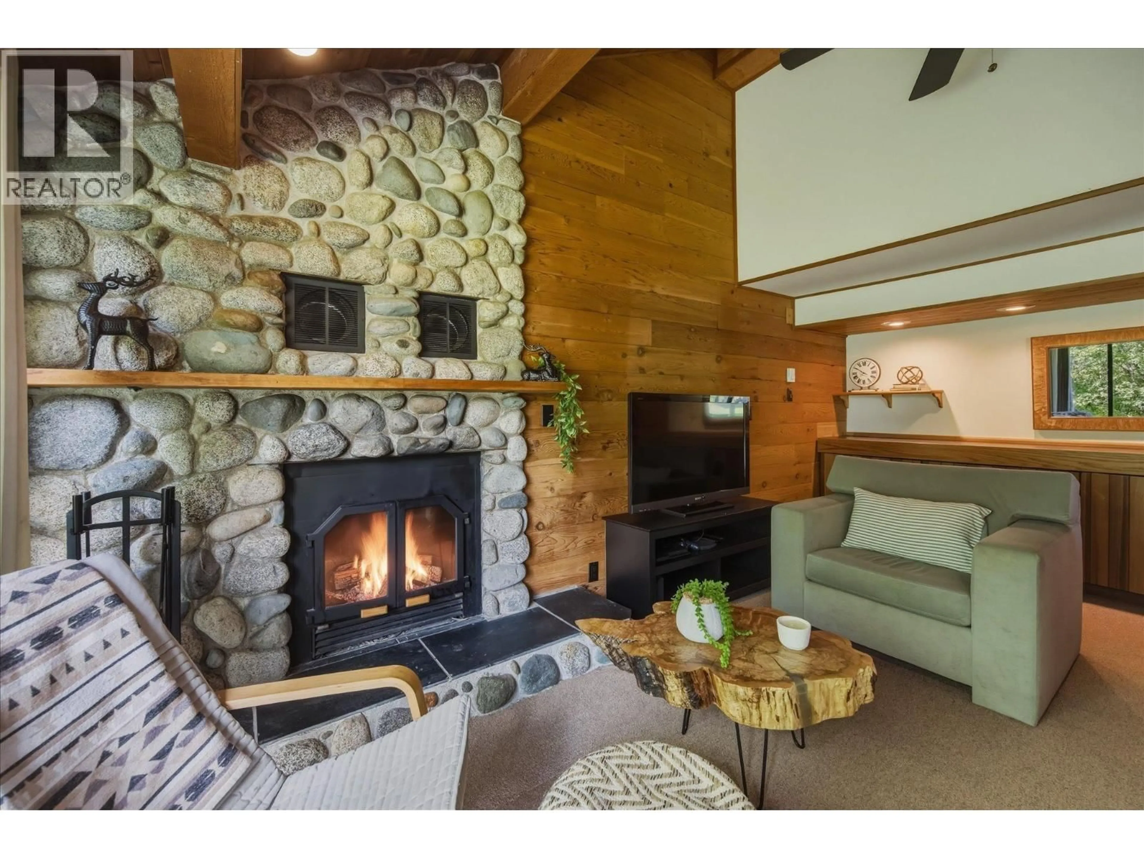 Living room with furniture, wood/laminate floor for C1 - 6900 CRABAPPLE DRIVE, Whistler British Columbia V8E0C5