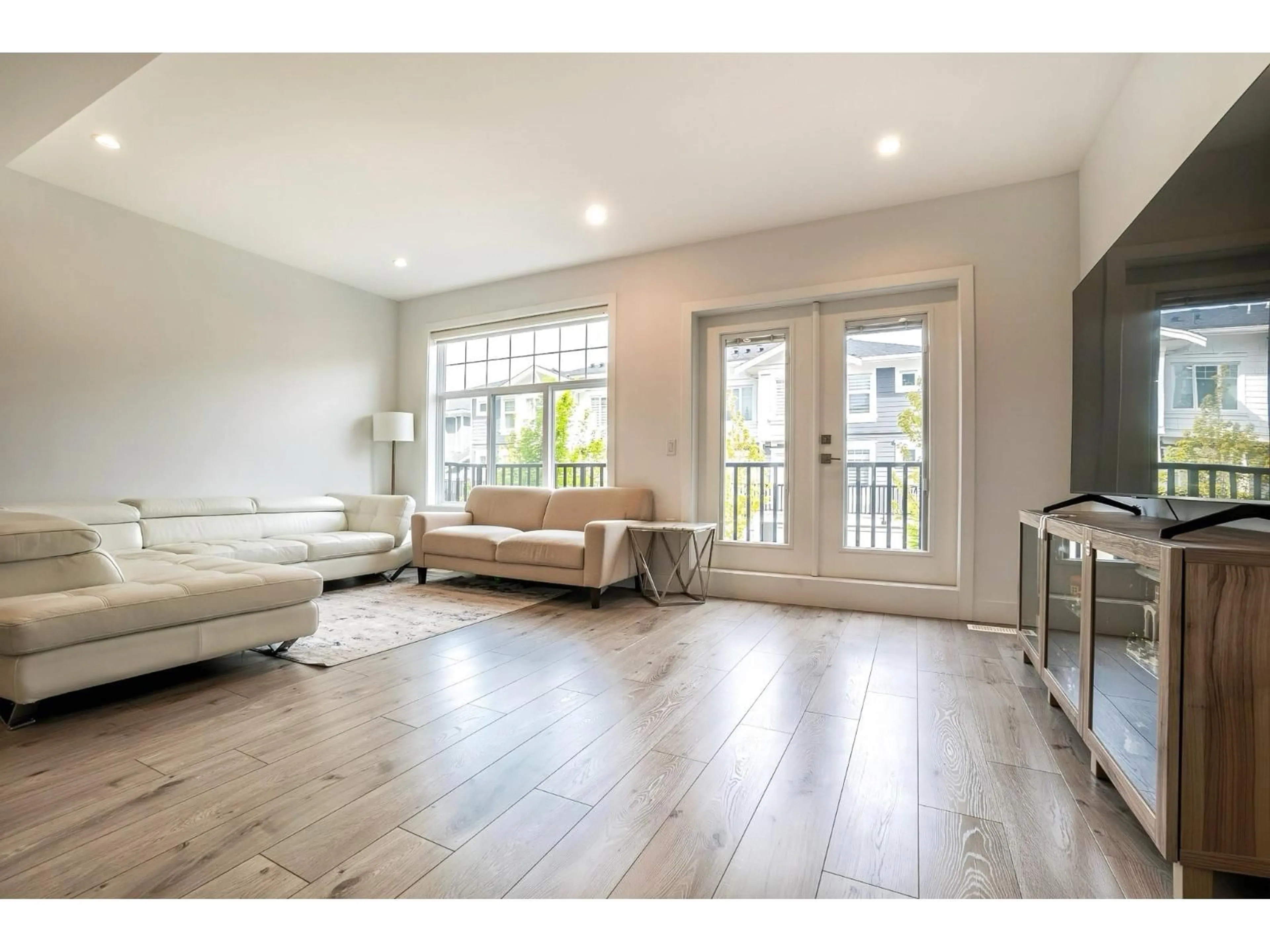 Living room with furniture, wood/laminate floor for 31 - 7167 116 STREET, Delta British Columbia V4E0A6