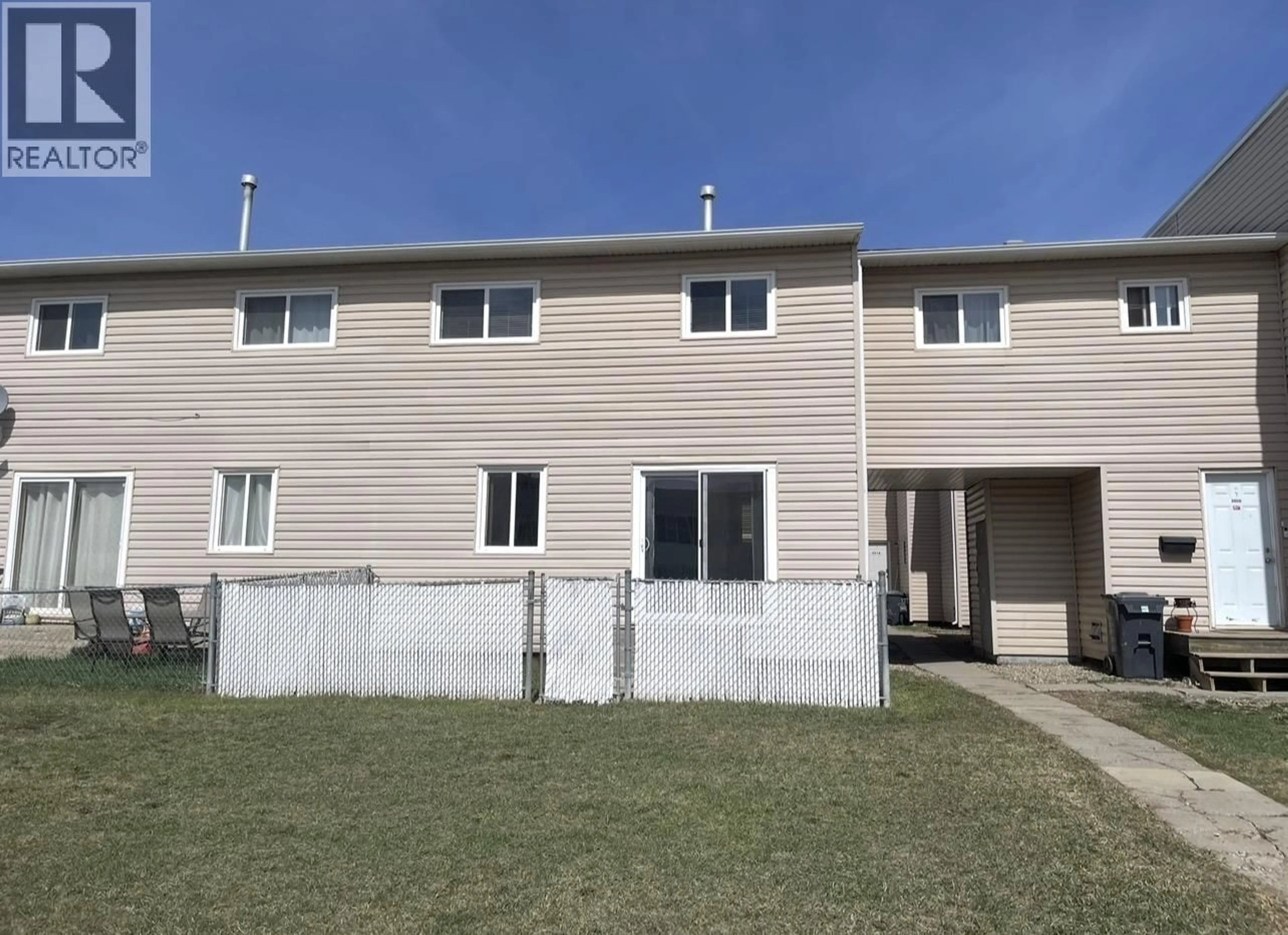 A pic from outside/outdoor area/front of a property/back of a property/a pic from drone, building for 8818 101 AVENUE, Fort St. John British Columbia V1J5G2