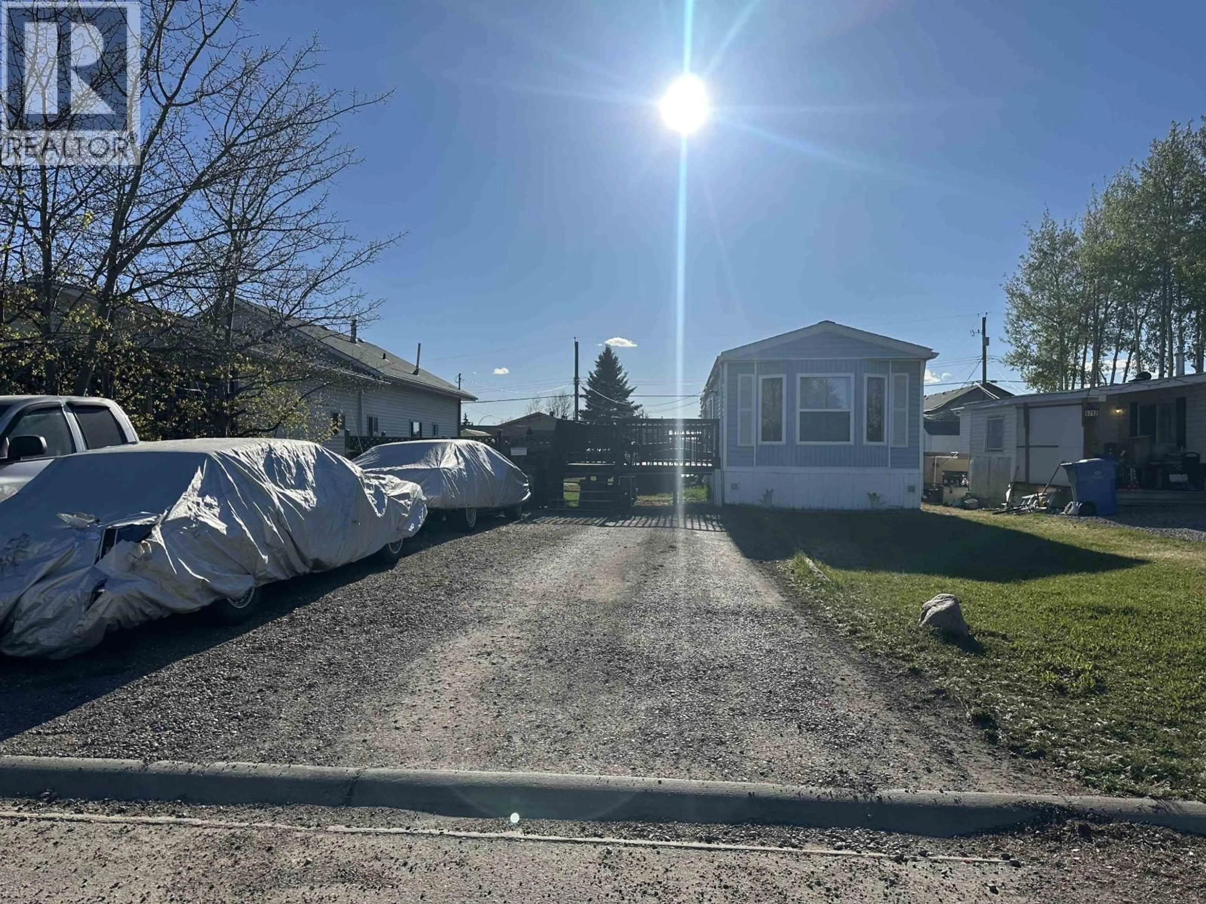 A pic from outside/outdoor area/front of a property/back of a property/a pic from drone, street for 8708 76 STREET, Fort St. John British Columbia V1J2Z6