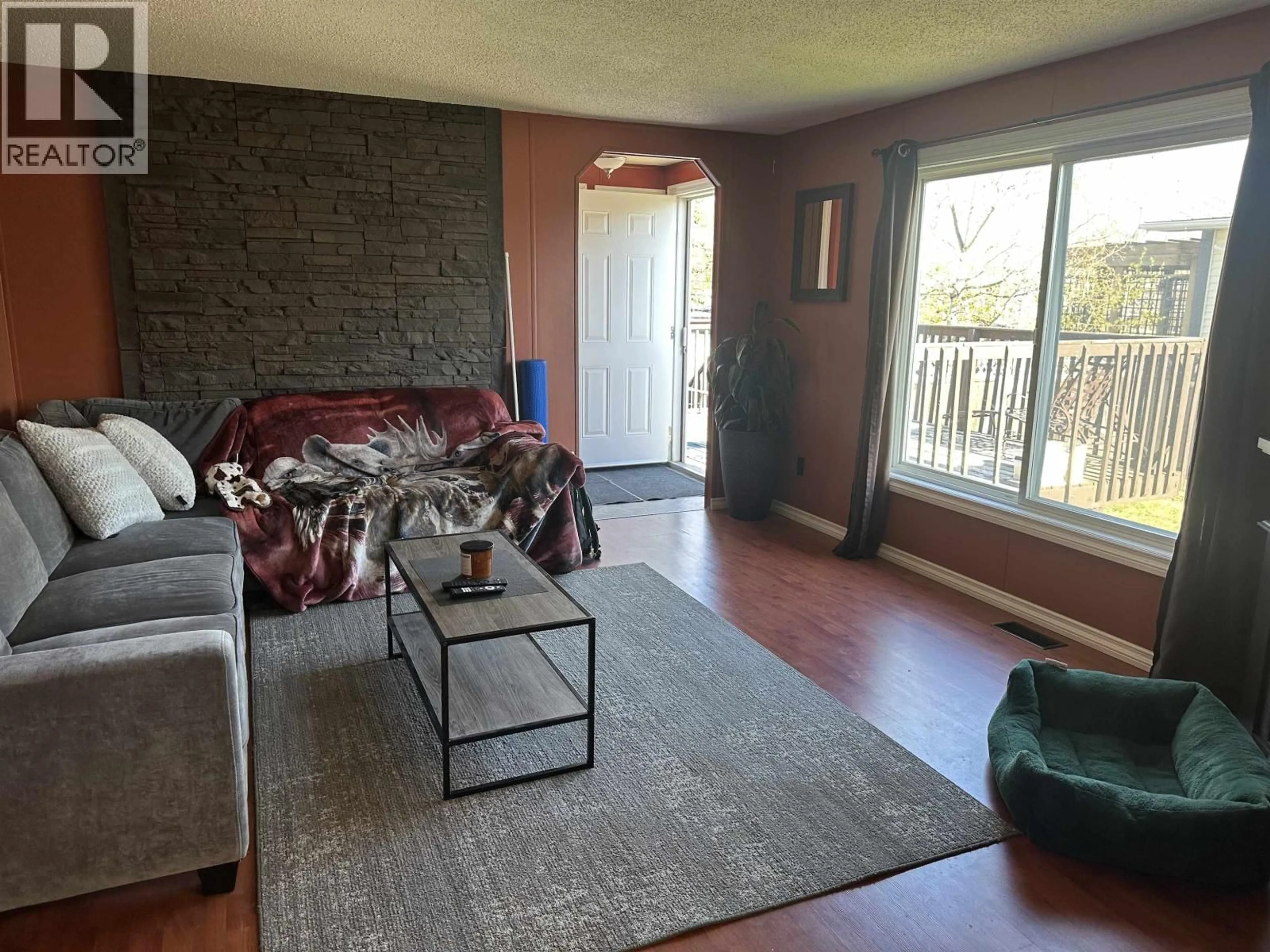 Living room with furniture, unknown for 8708 76 STREET, Fort St. John British Columbia V1J2Z6