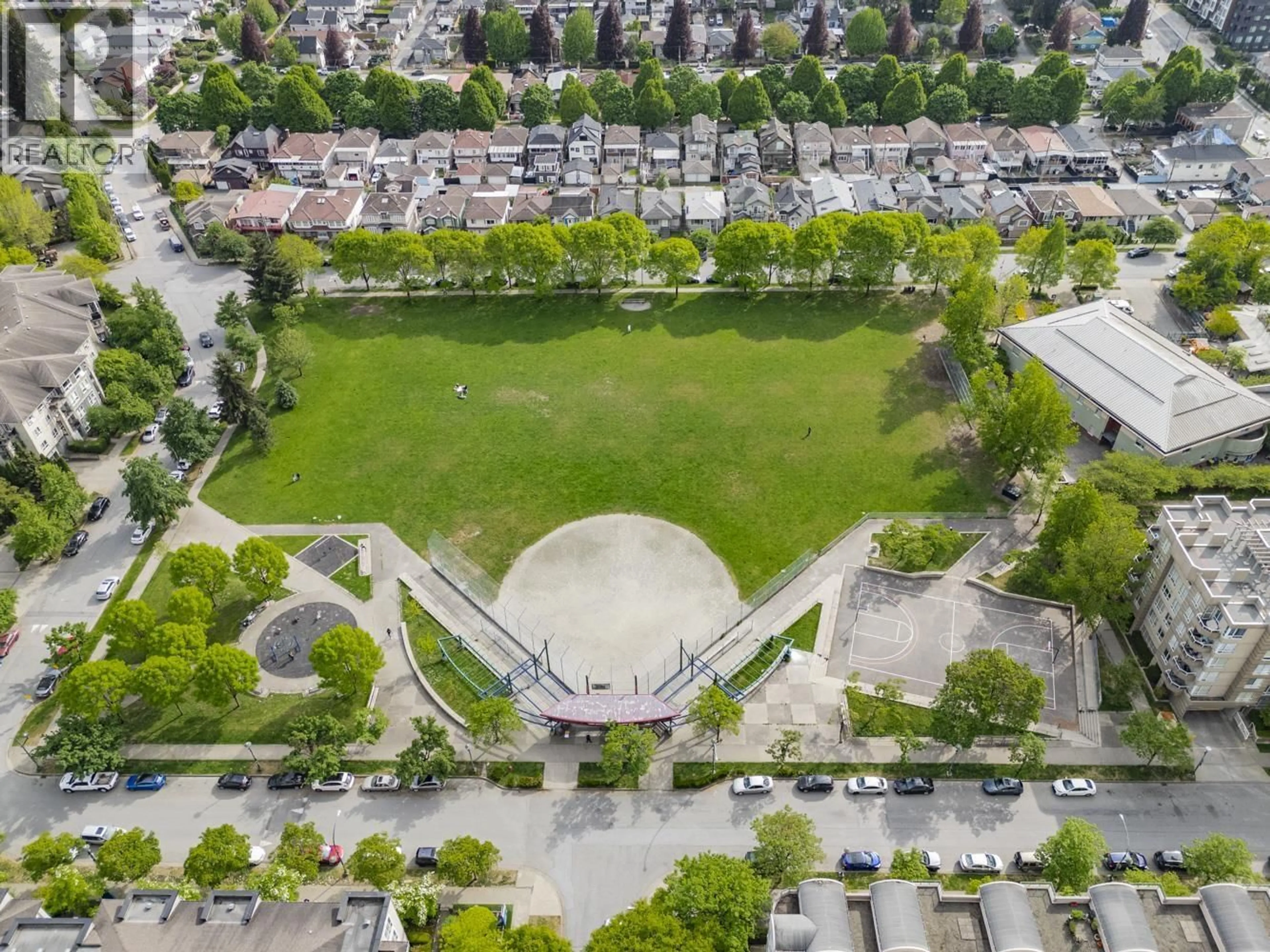 A pic from outside/outdoor area/front of a property/back of a property/a pic from drone, street for 503 - 3520 CROWLEY DRIVE, Vancouver British Columbia V5R6G9