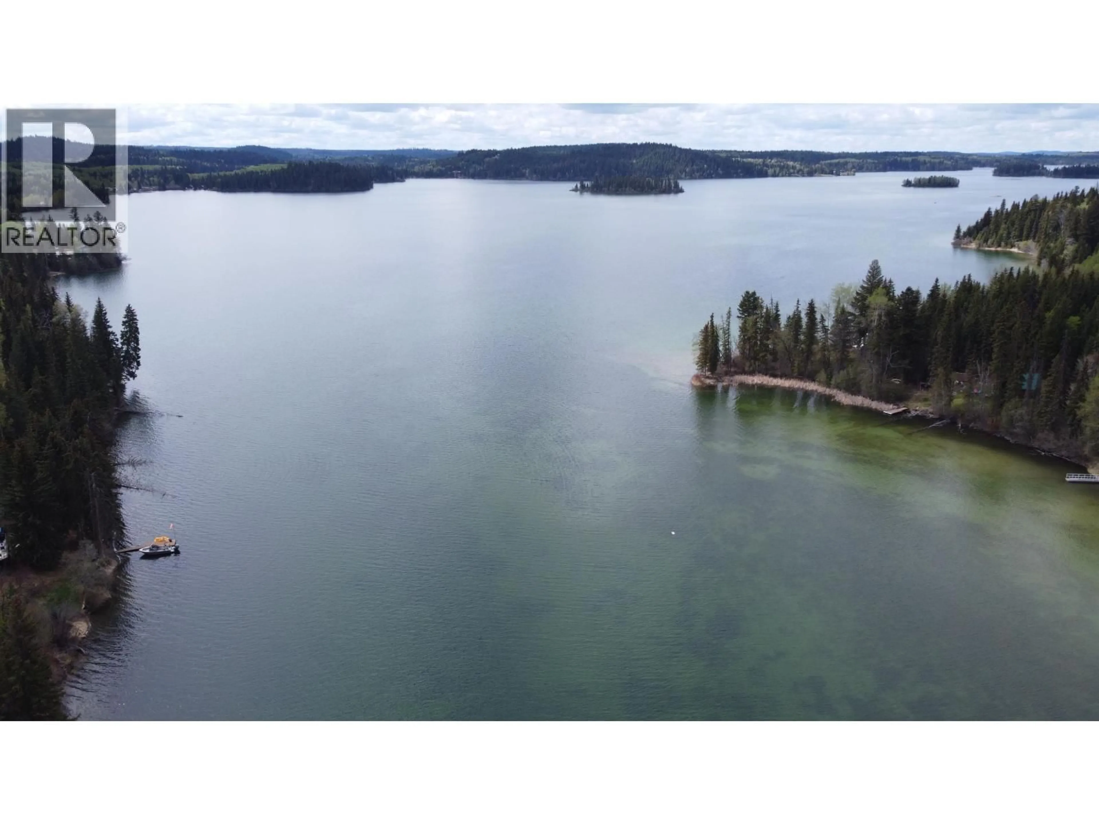 A pic from outside/outdoor area/front of a property/back of a property/a pic from drone, water/lake/river/ocean view for 8398 BRIDGE LAKE ROAD, Bridge Lake British Columbia V0K1X2