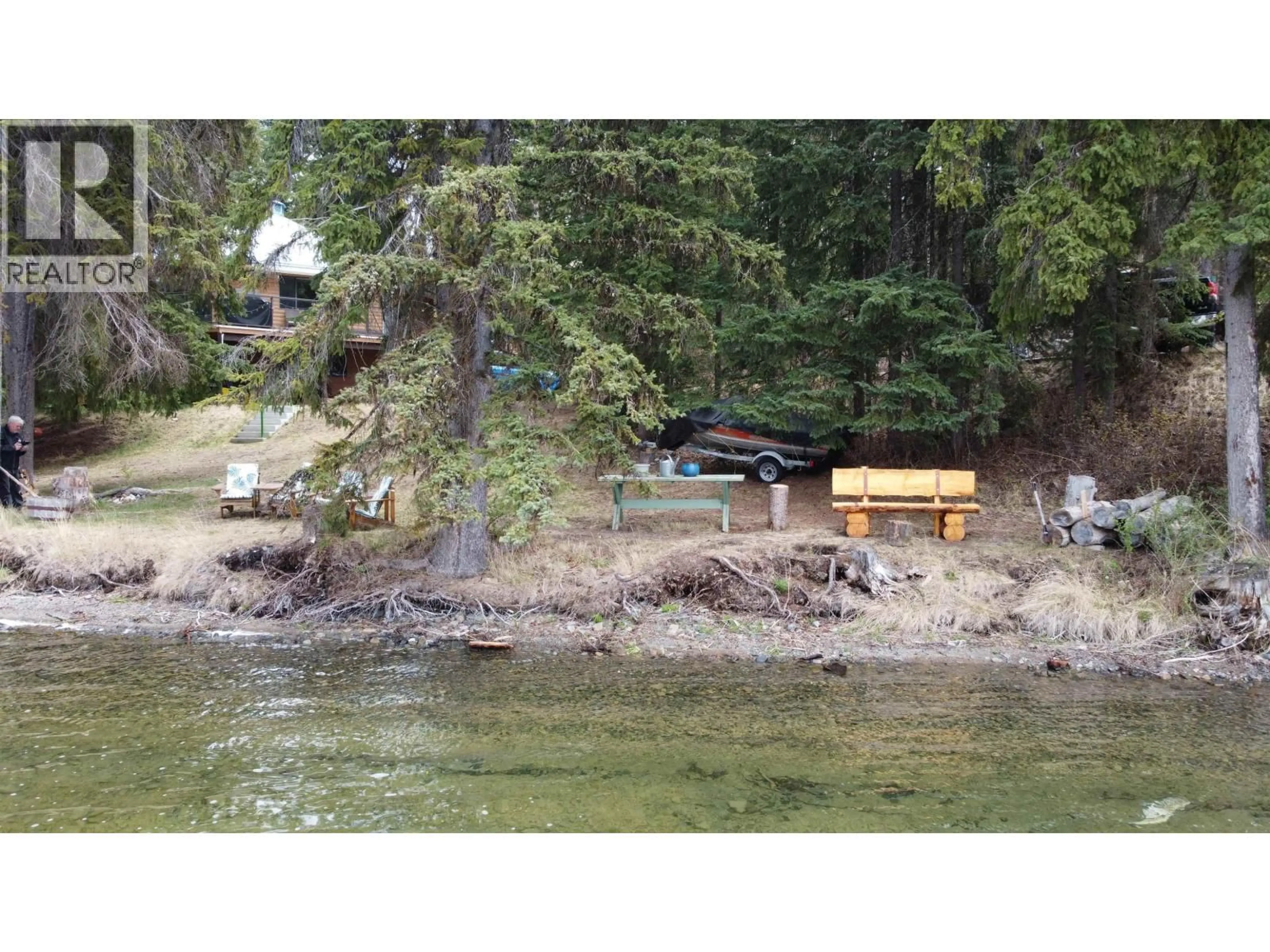 A pic from outside/outdoor area/front of a property/back of a property/a pic from drone, water/lake/river/ocean view for 8398 BRIDGE LAKE ROAD, Bridge Lake British Columbia V0K1X2