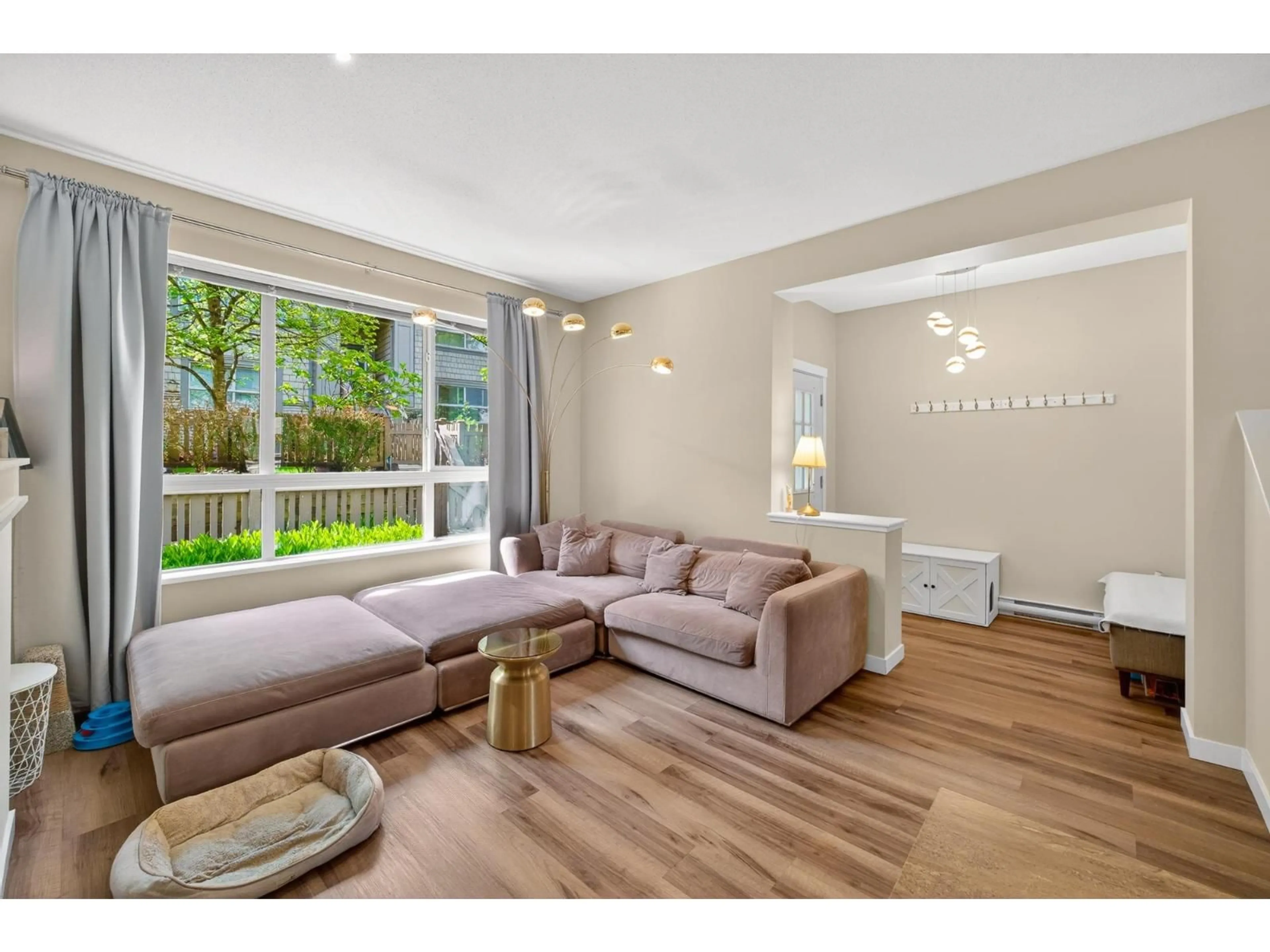 Living room with furniture, wood/laminate floor for 96 - 2738 158 STREET, Surrey British Columbia V3Z3K3