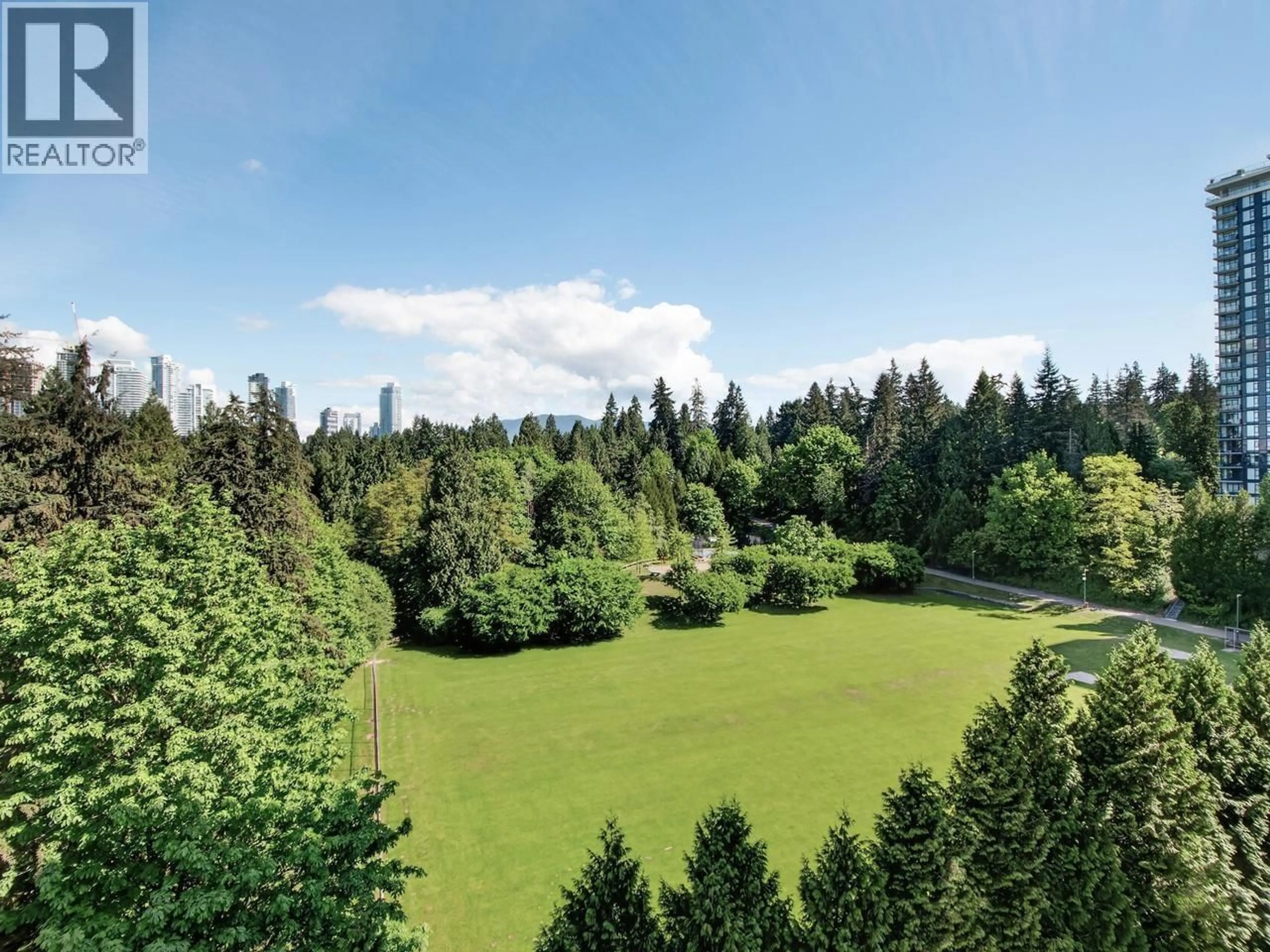 A pic from outside/outdoor area/front of a property/back of a property/a pic from drone, forest/trees view for 1102 - 551 AUSTIN AVENUE, Coquitlam British Columbia V3K6R7