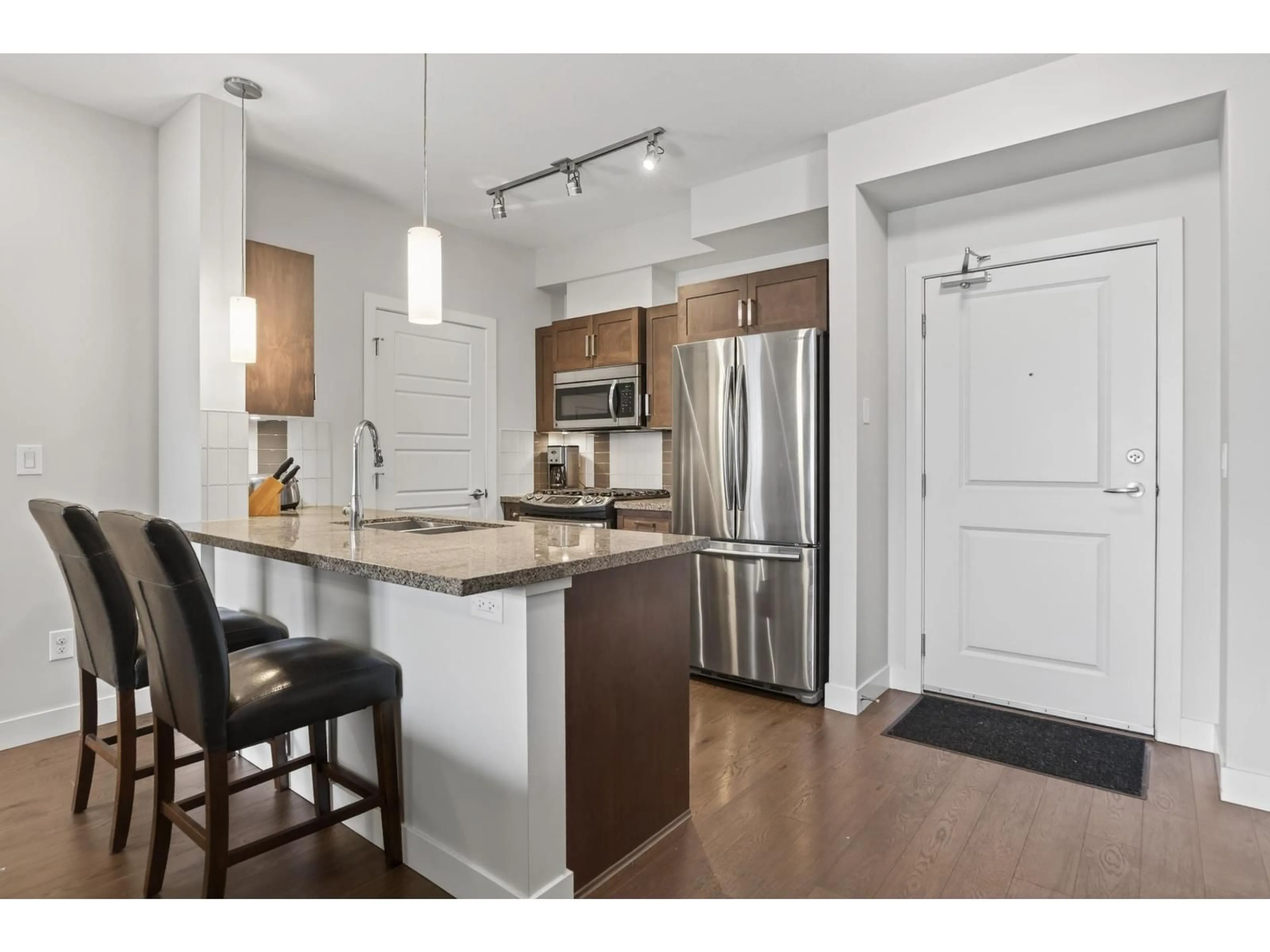 Open concept kitchen, unknown for 216 - 20068 FRASER HIGHWAY, Langley British Columbia V3A0H2
