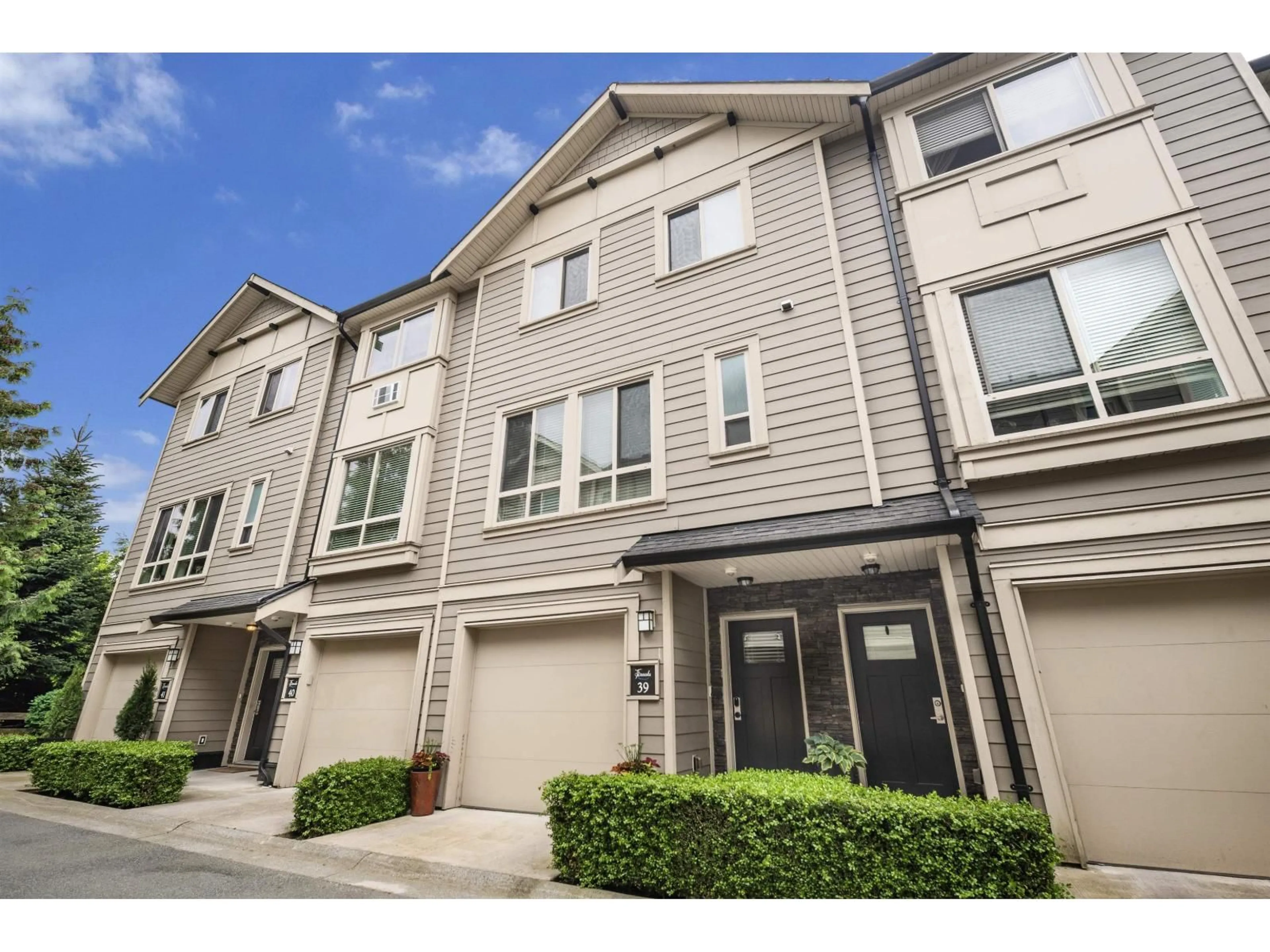 A pic from outside/outdoor area/front of a property/back of a property/a pic from drone, street for 39 - 19913 70 AVENUE, Langley British Columbia V2Y0S9