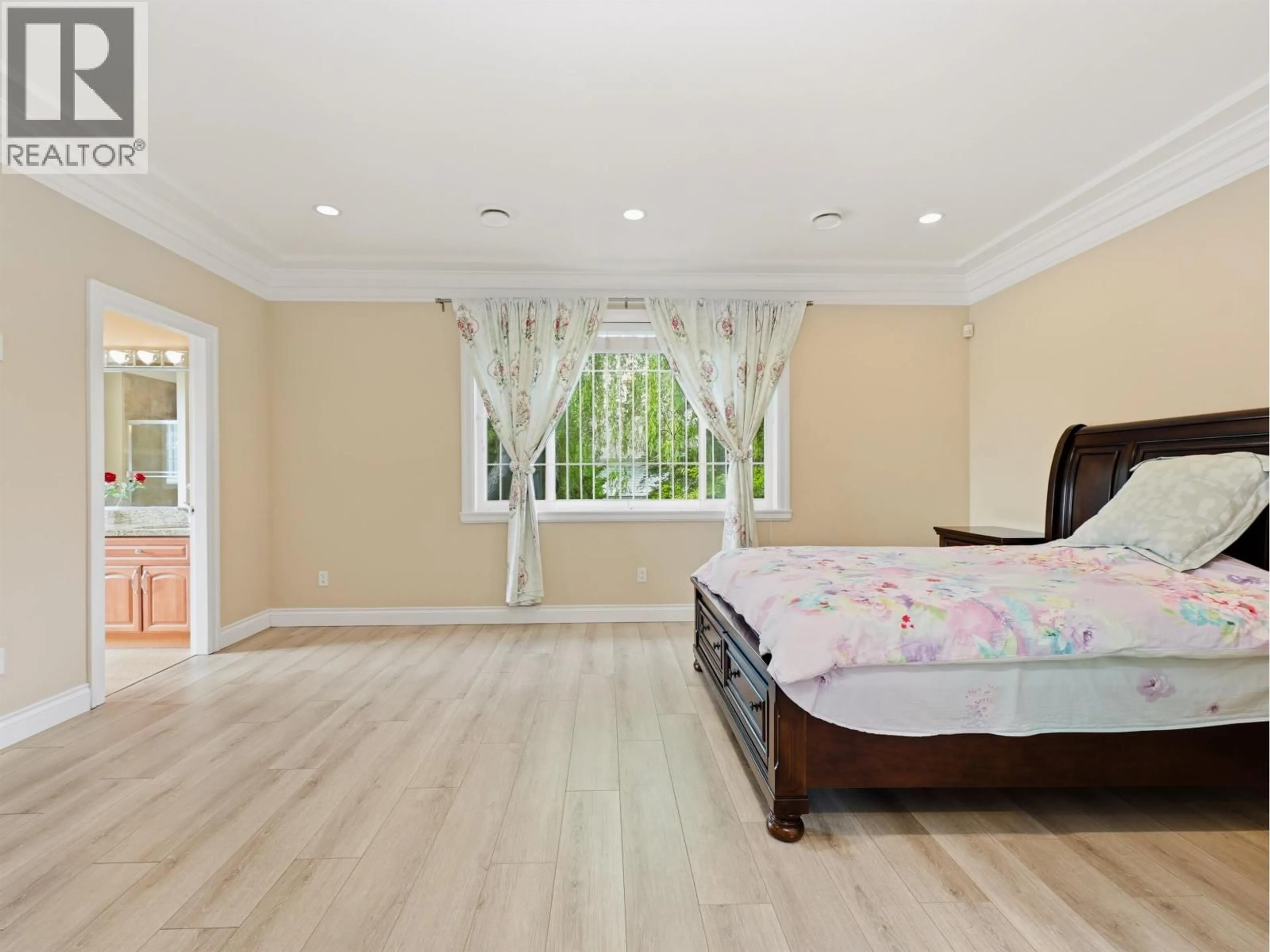 Bedroom with bed, wood/laminate floor for 5631 CLEARWATER DRIVE, Richmond British Columbia V7C3B6