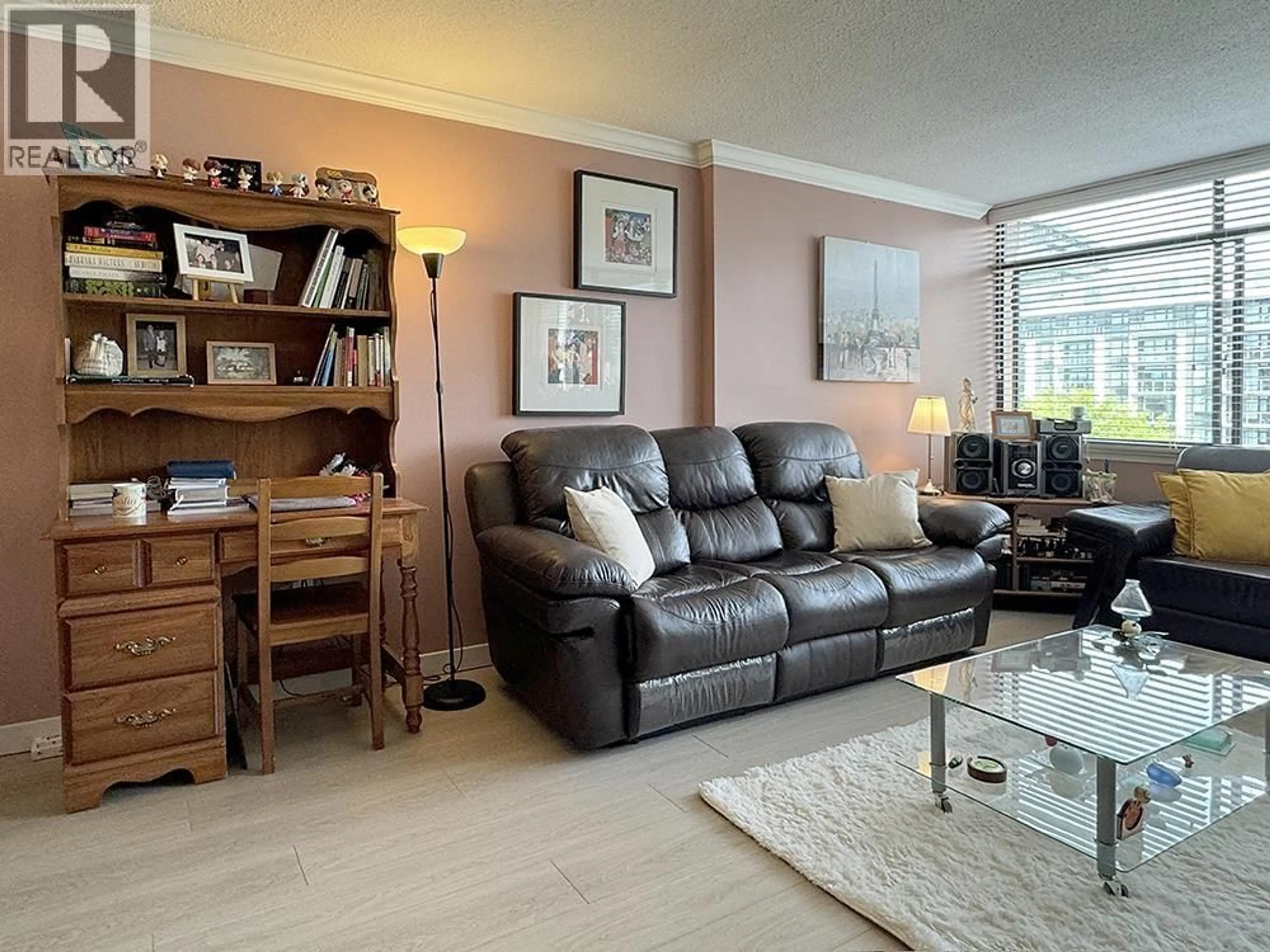 Living room with furniture, wood/laminate floor for 703 - 6631 MINORU BOULEVARD, Richmond British Columbia V6Y1Z1