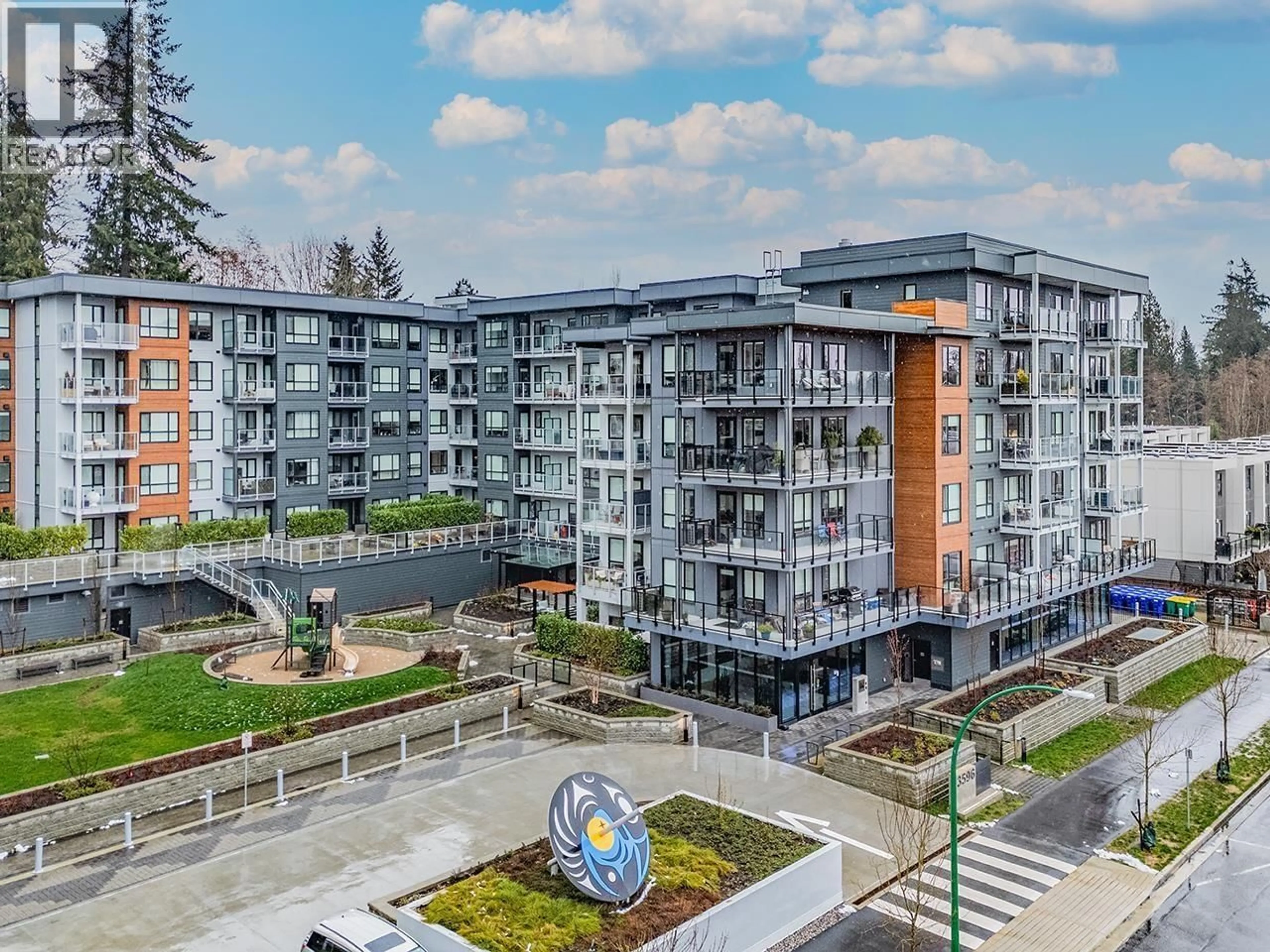 A pic from outside/outdoor area/front of a property/back of a property/a pic from drone, unknown for 303 - 3596 MALSUM DRIVE, North Vancouver British Columbia V7G0B5