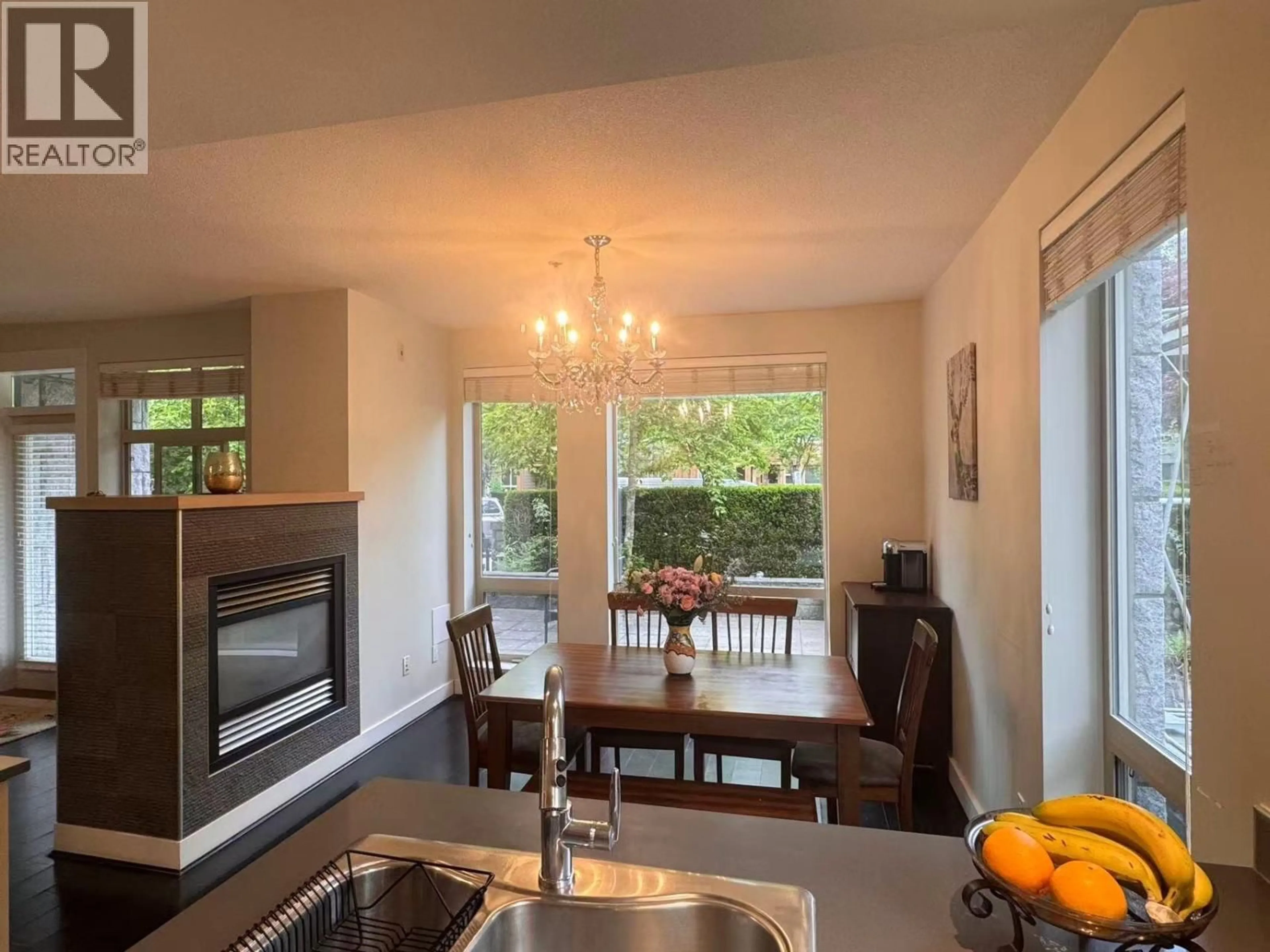 Open concept kitchen, wood/laminate floor for 112 - 5779 BIRNEY AVENUE, Vancouver British Columbia V6S0A3