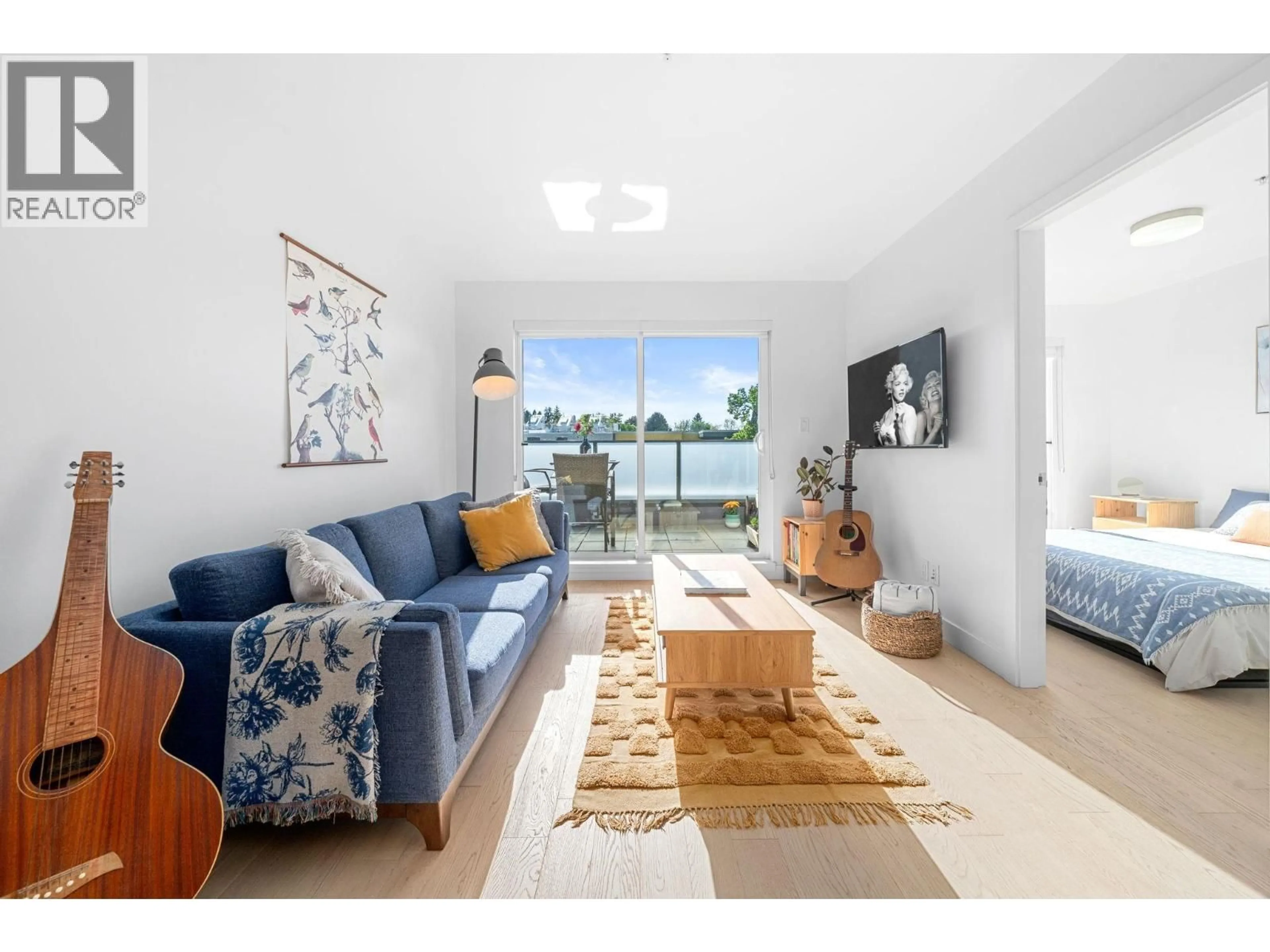 Living room with furniture, unknown for 516 - 3456 COMMERCIAL STREET, Vancouver British Columbia V5N4E9