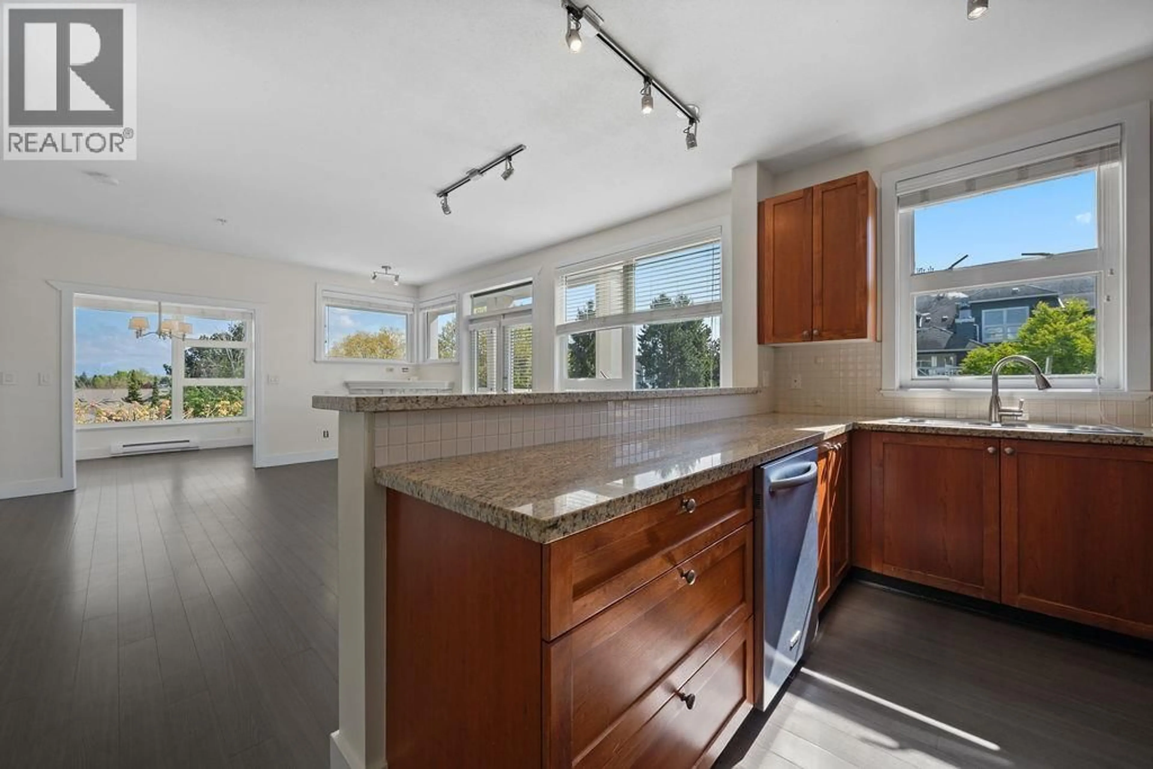 Open concept kitchen, ceramic/tile floor for 306 - 4600 WESTWATER DRIVE, Richmond British Columbia V7E6S2