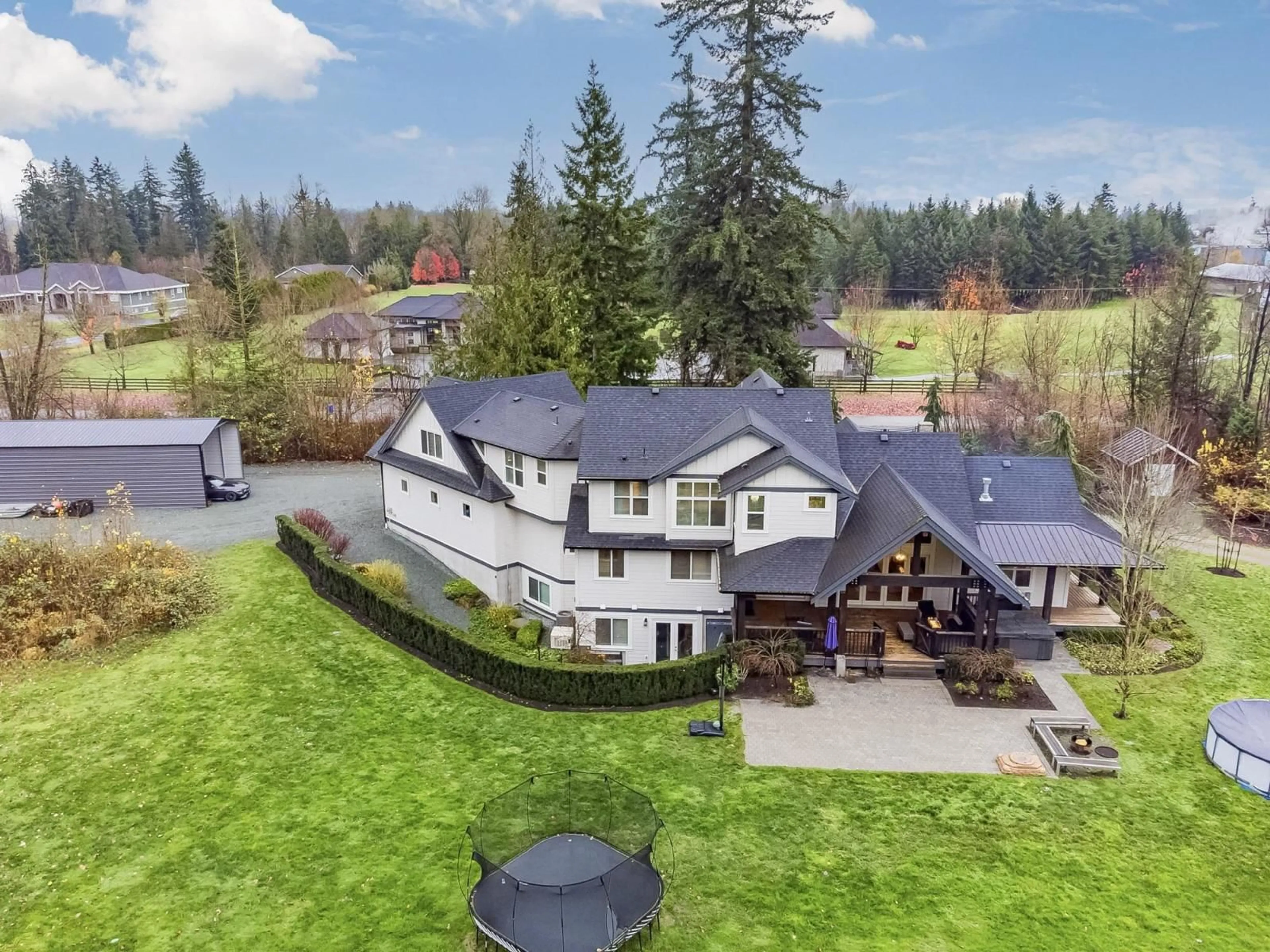 A pic from outside/outdoor area/front of a property/back of a property/a pic from drone, mountain view for 26979 58 AVENUE, Langley British Columbia V4W1V6
