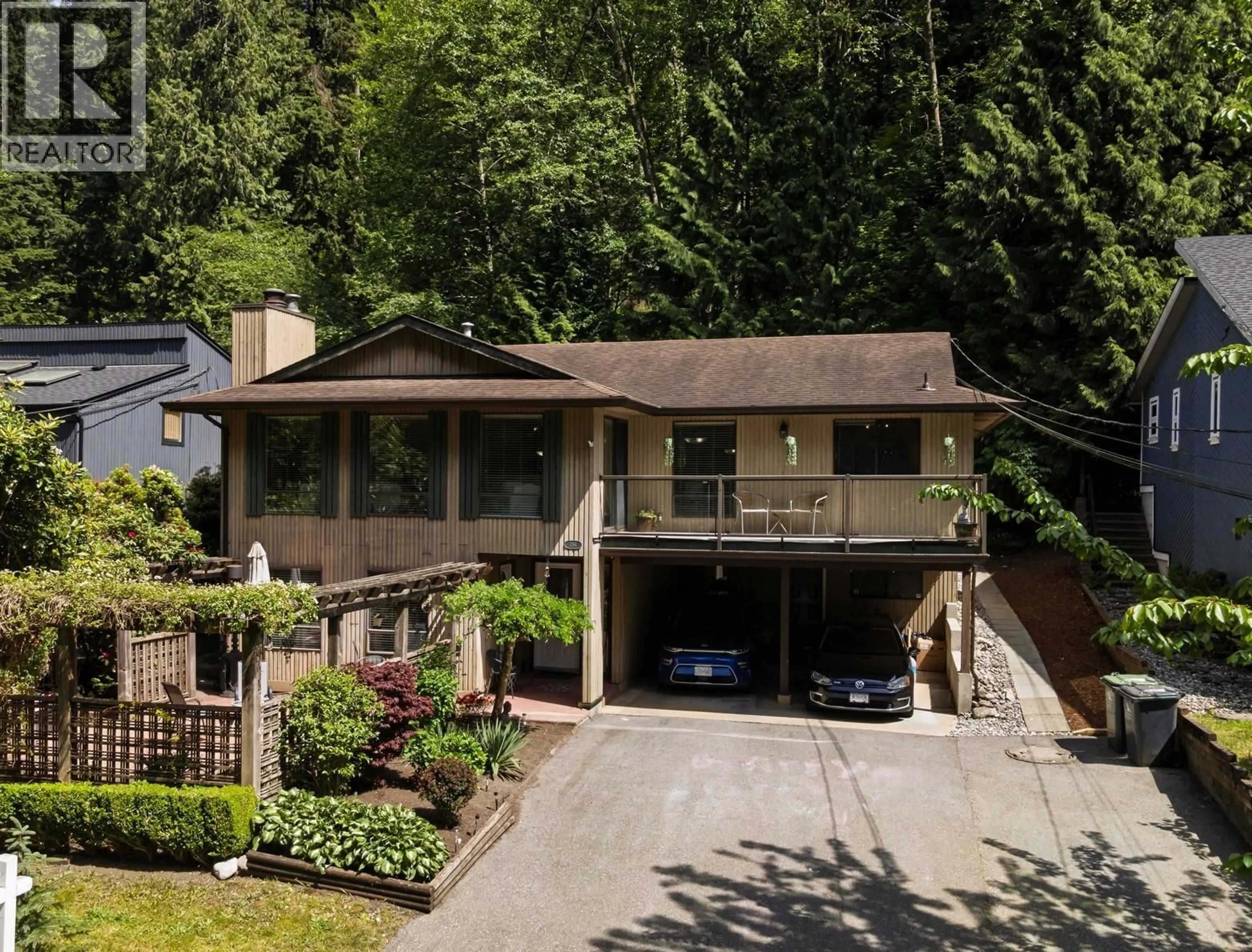 A pic from outside/outdoor area/front of a property/back of a property/a pic from drone, street for 1184 RIVERSIDE DRIVE, North Vancouver British Columbia V7H1V5