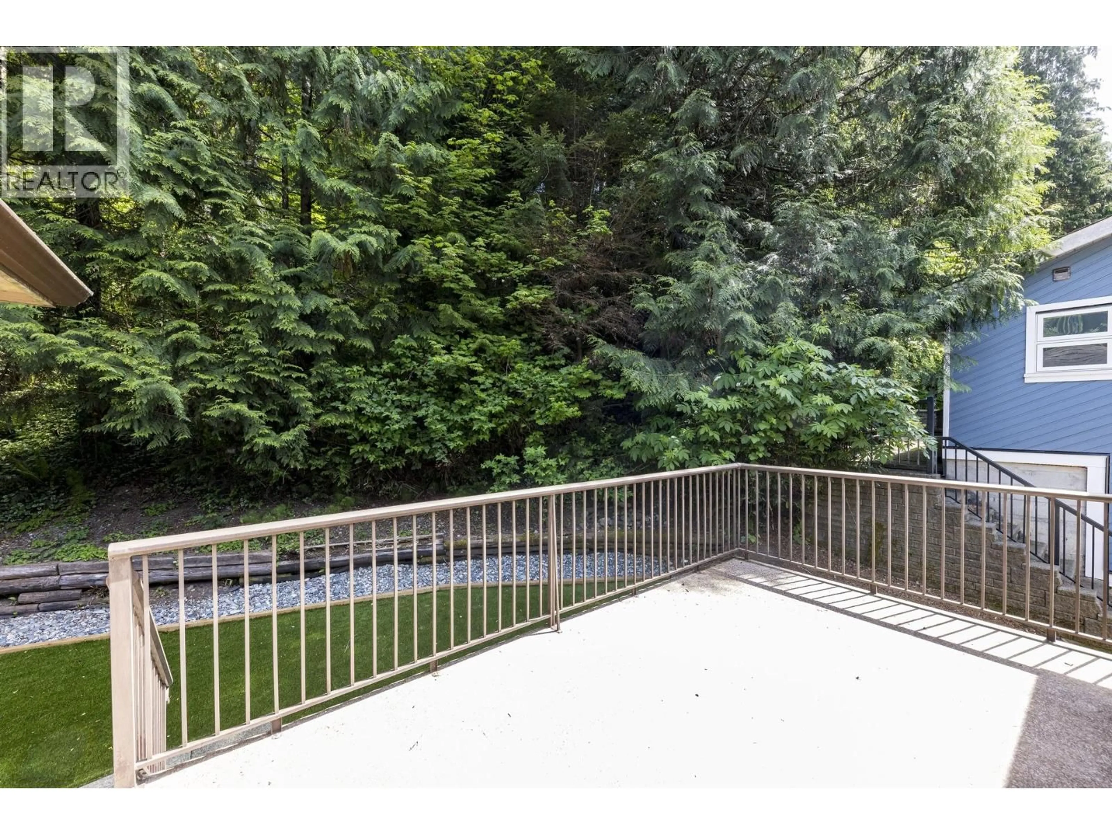 A pic from outside/outdoor area/front of a property/back of a property/a pic from drone, forest/trees view for 1184 RIVERSIDE DRIVE, North Vancouver British Columbia V7H1V5