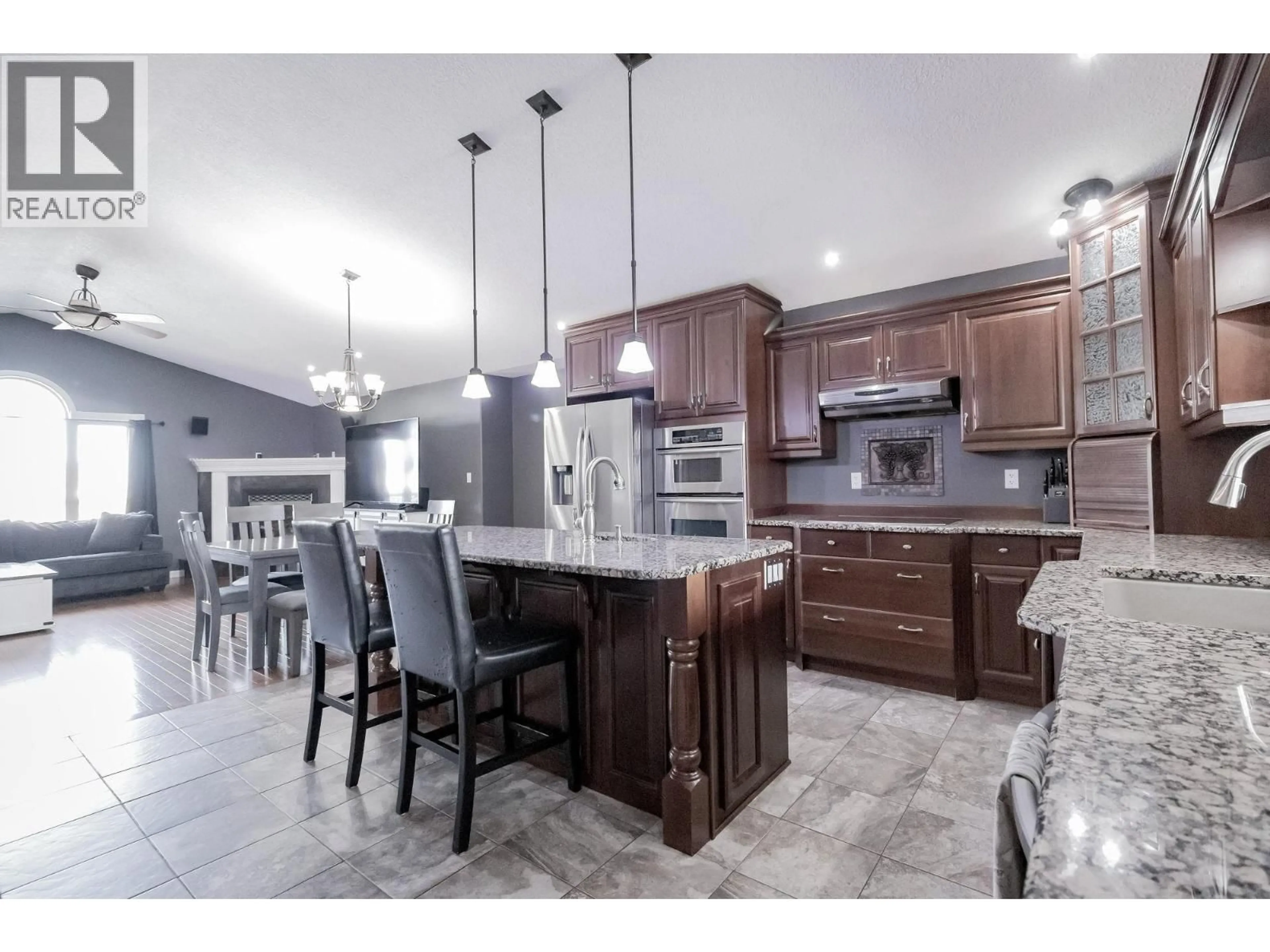 Open concept kitchen, ceramic/tile floor for 8019 97 AVENUE, Fort St. John British Columbia V1J1L7