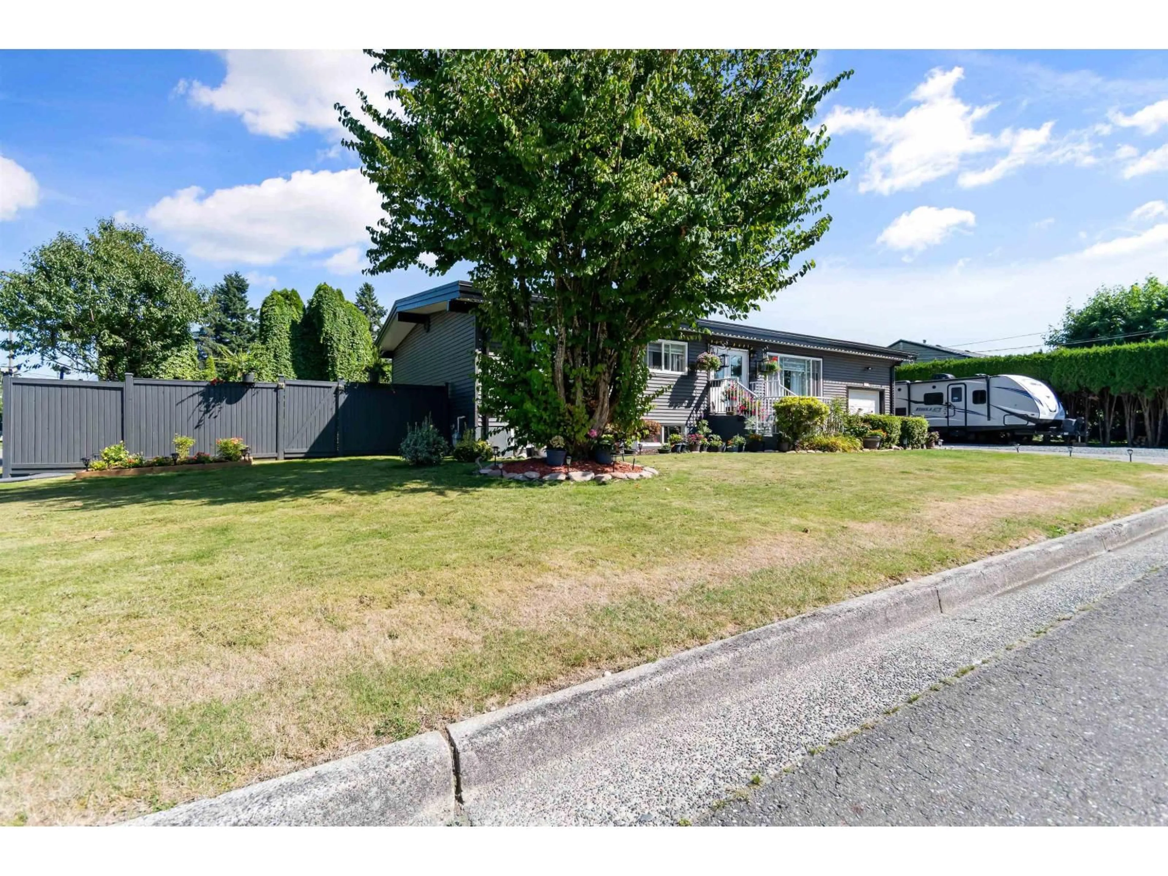 A pic from outside/outdoor area/front of a property/back of a property/a pic from drone, unknown for 8550 NORMAN CRESCENT, Chilliwack British Columbia V2P5C6