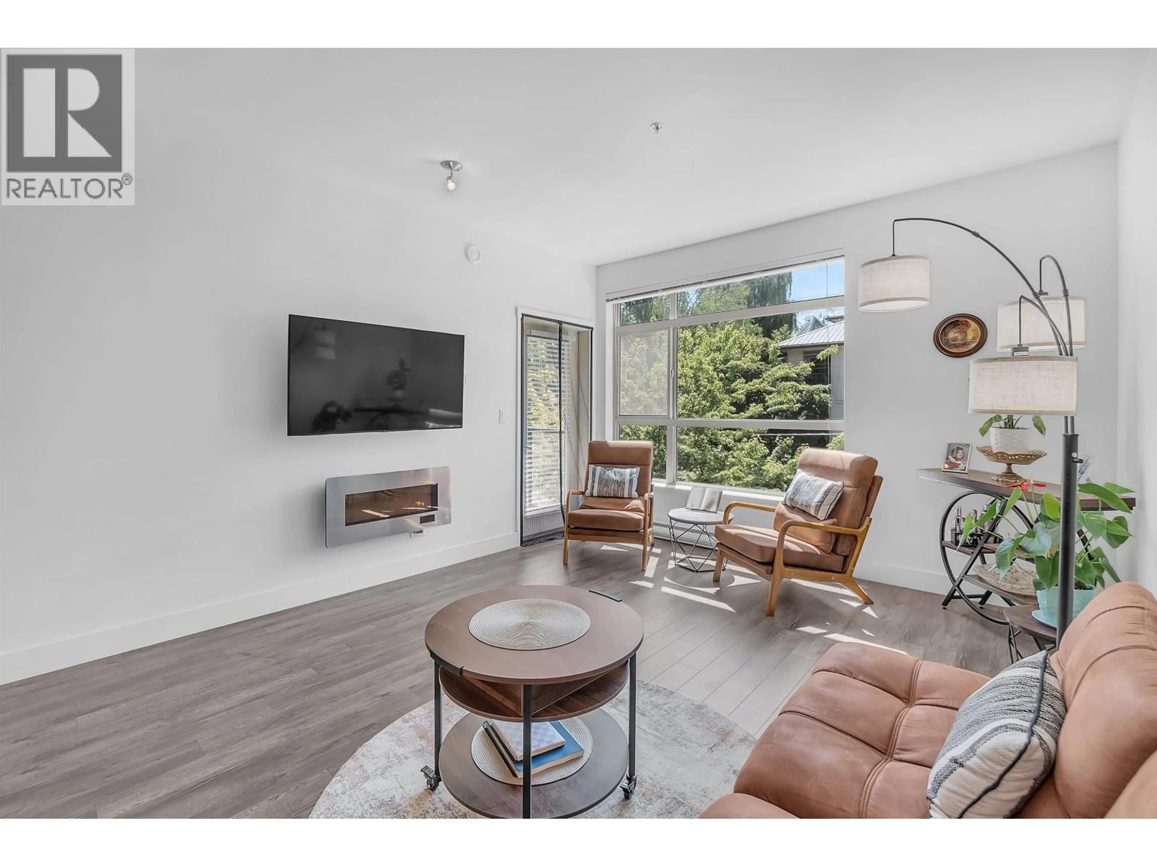 Living room with furniture, unknown for 216 - 2436 KELLY AVENUE, Port Coquitlam British Columbia V3C1Y4