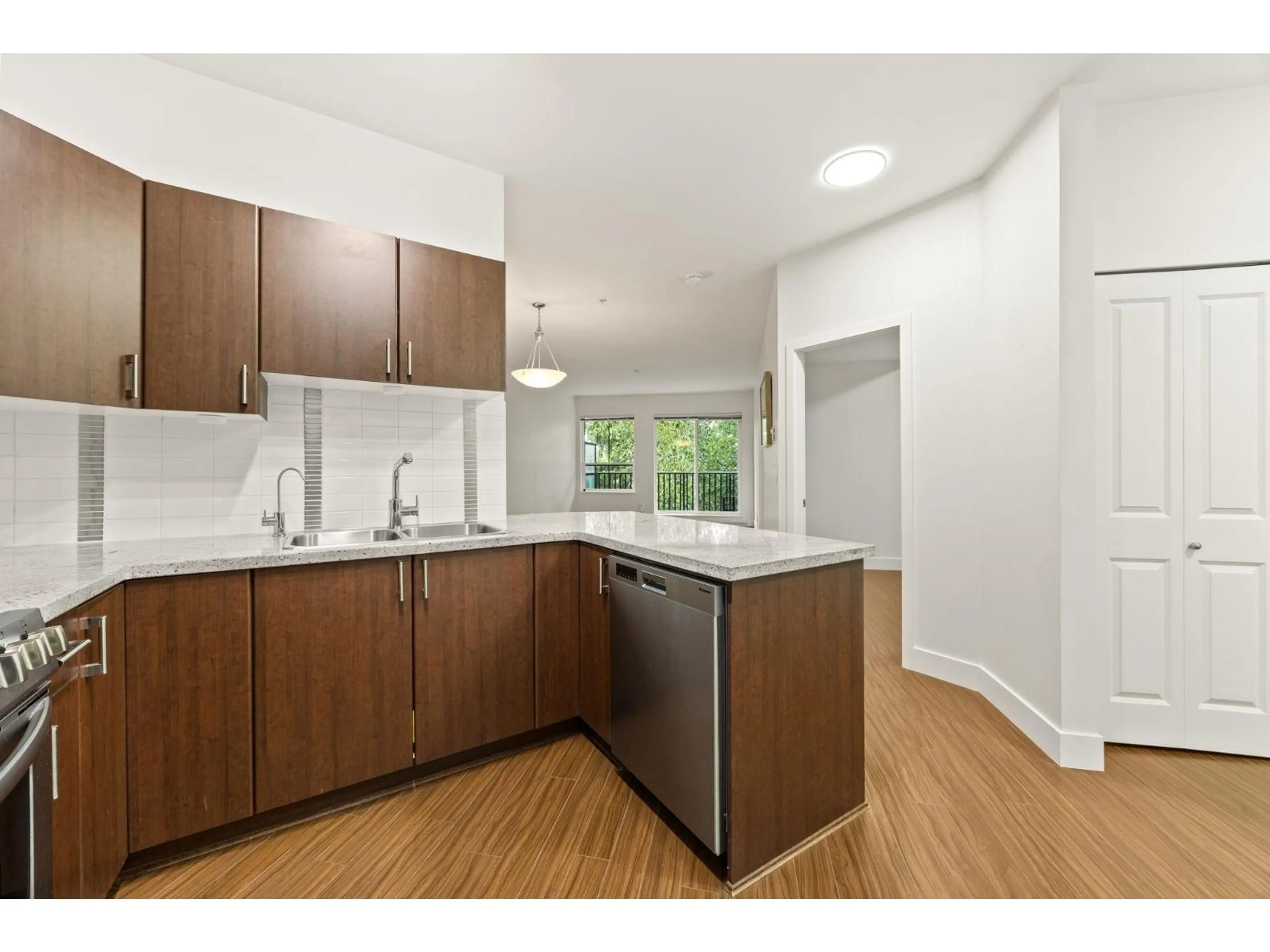 Standard kitchen, wood/laminate floor for 308 - 19830 56 AVENUE, Langley British Columbia V3A0A5