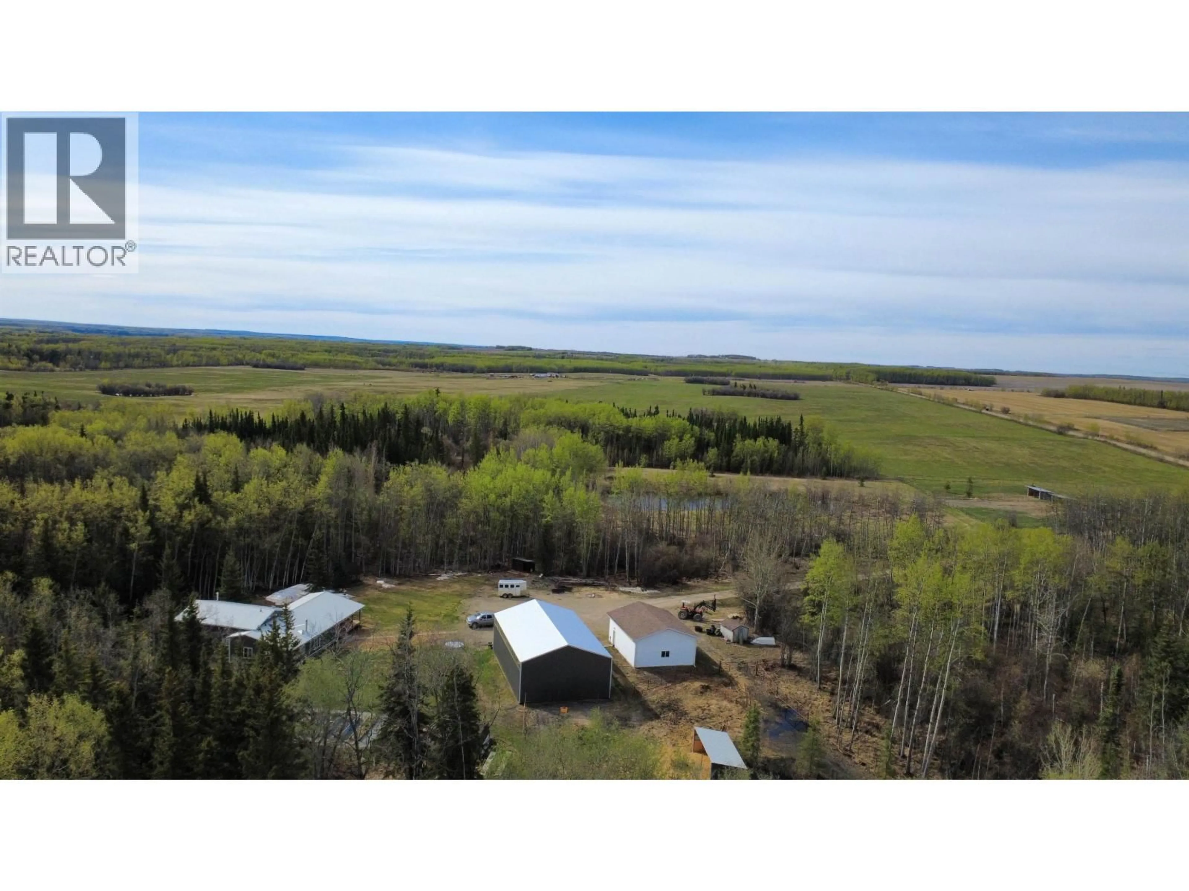 A pic from outside/outdoor area/front of a property/back of a property/a pic from drone, unknown for 17131 259 ROAD, Fort St. John British Columbia V0C1Y0