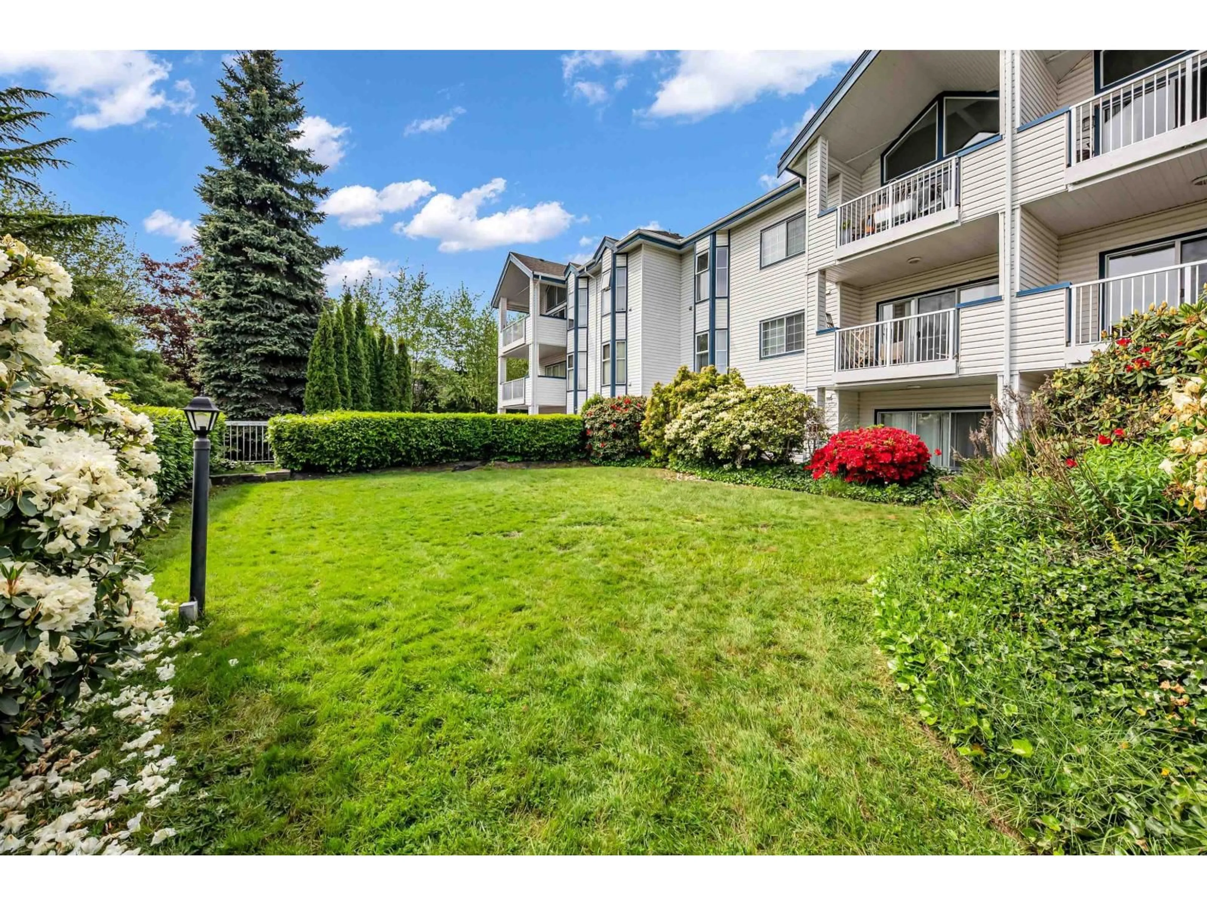A pic from outside/outdoor area/front of a property/back of a property/a pic from drone, mountain view for 212 - 13918 72 AVENUE, Surrey British Columbia V3W0T4