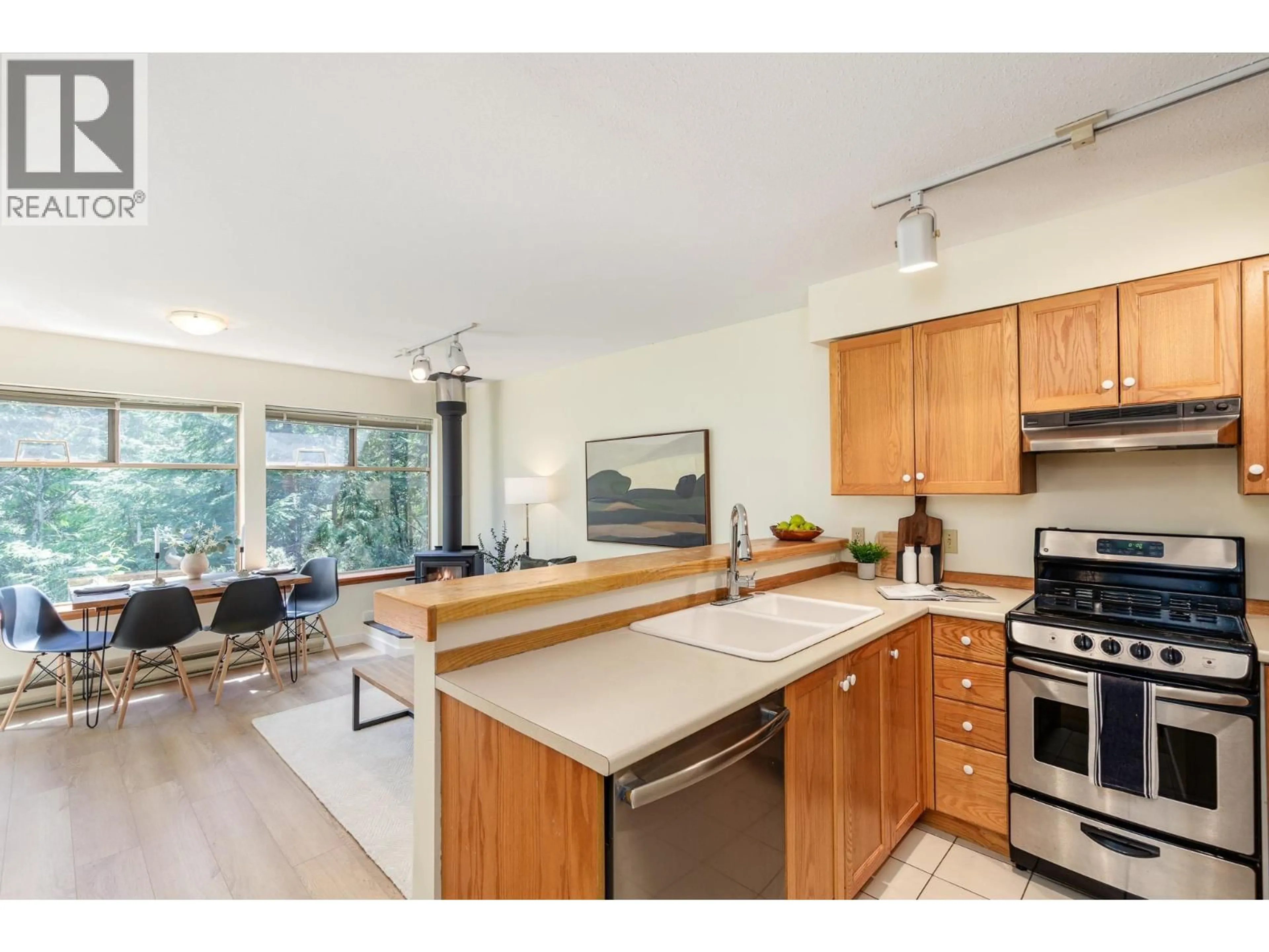 Open concept kitchen, unknown for 301 - 3050 HILLCREST DRIVE, Whistler British Columbia V8E0T8