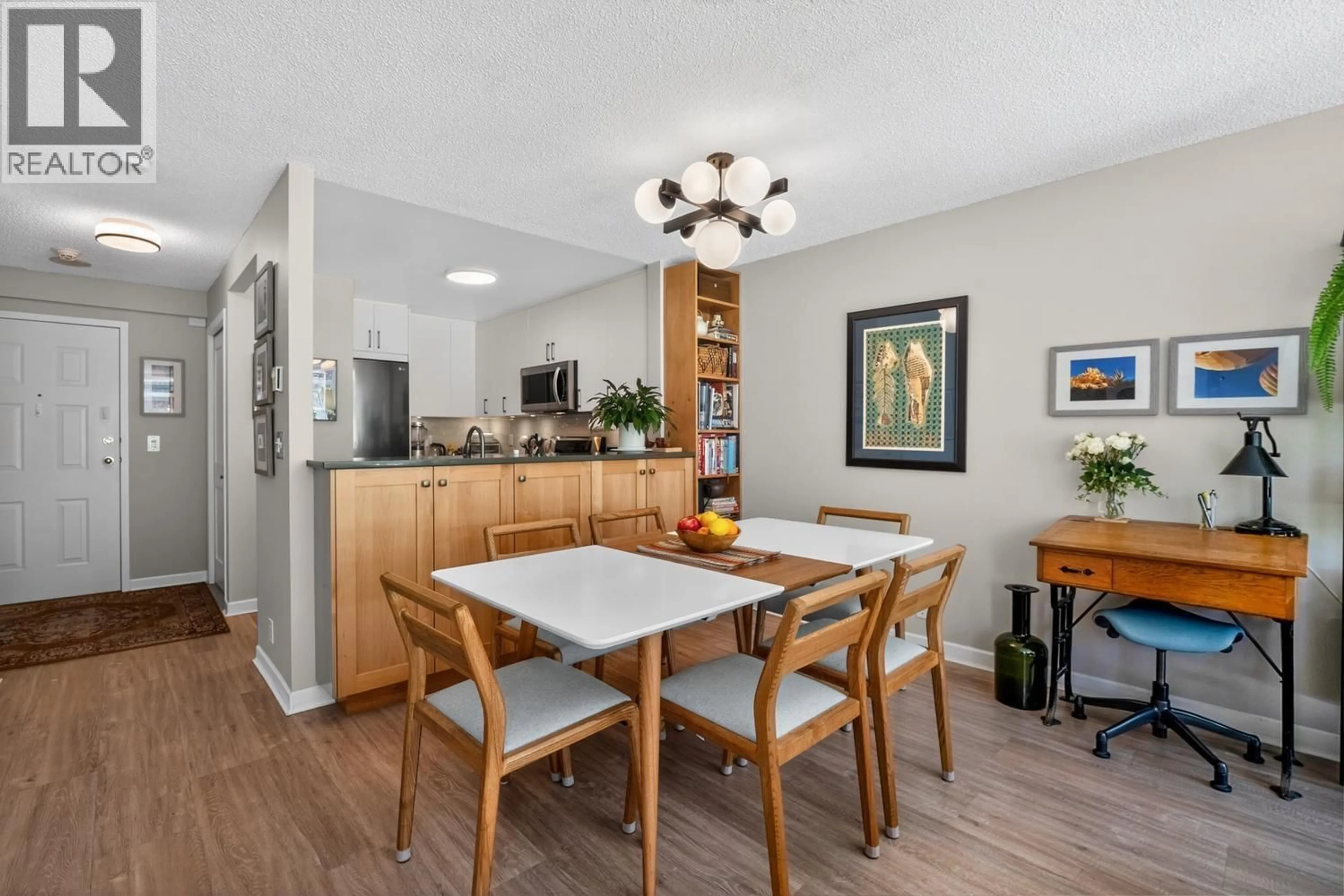 Open concept kitchen, wood/laminate floor for 305 - 456 MOBERLY ROAD, Vancouver British Columbia V5Z4L7
