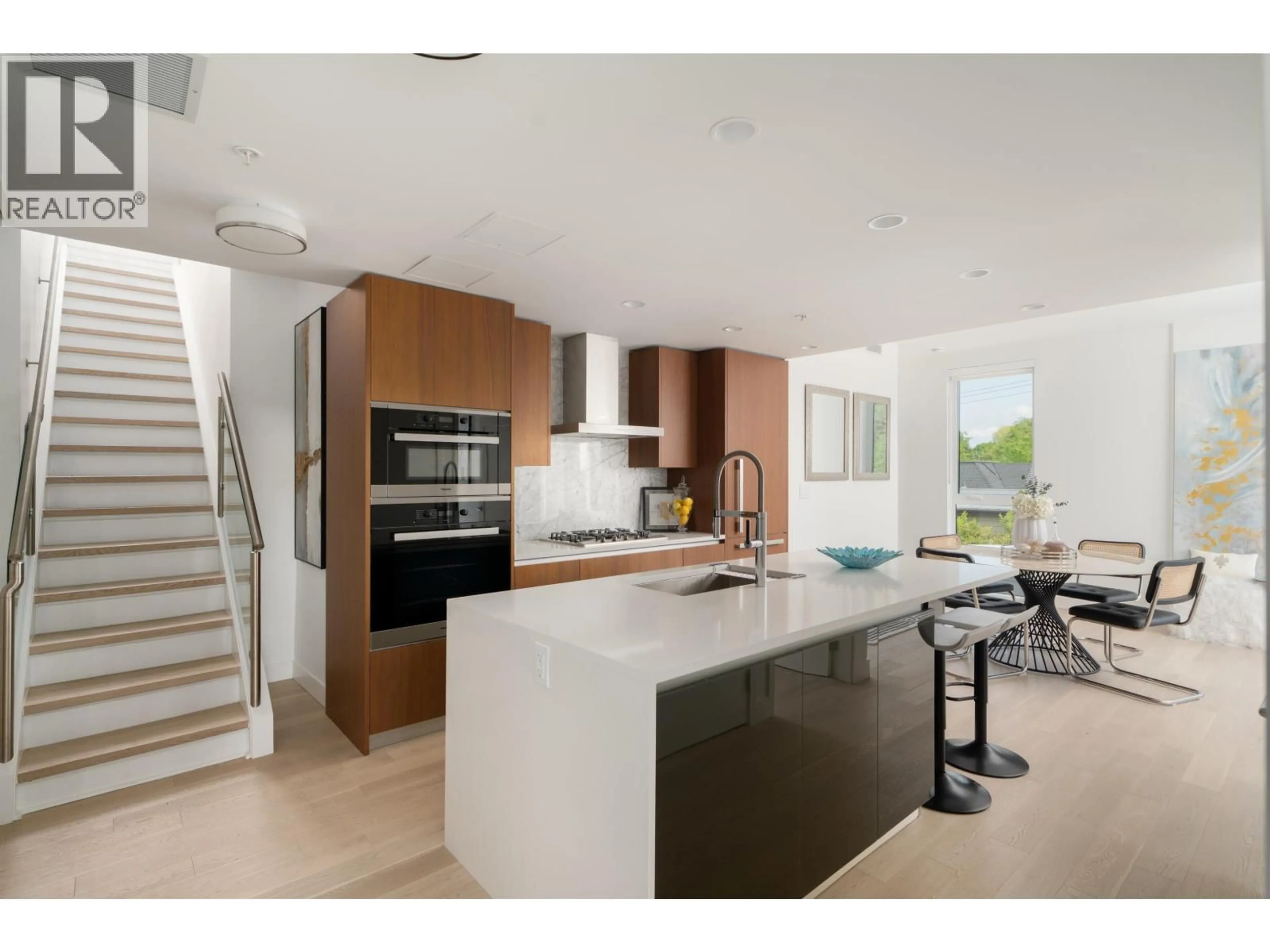 Open concept kitchen, ceramic/tile floor for 404 - 2888 ARBUTUS STREET, Vancouver British Columbia V6J0J1